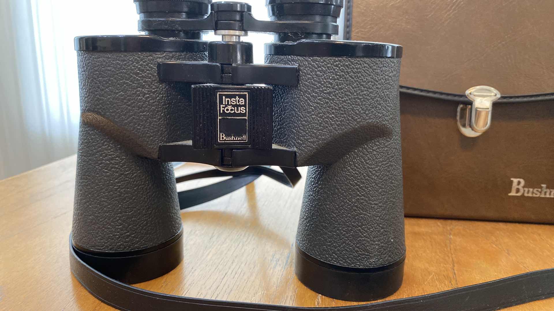 Photo 1 of BUSHNELL BINOCULARS AND MORE