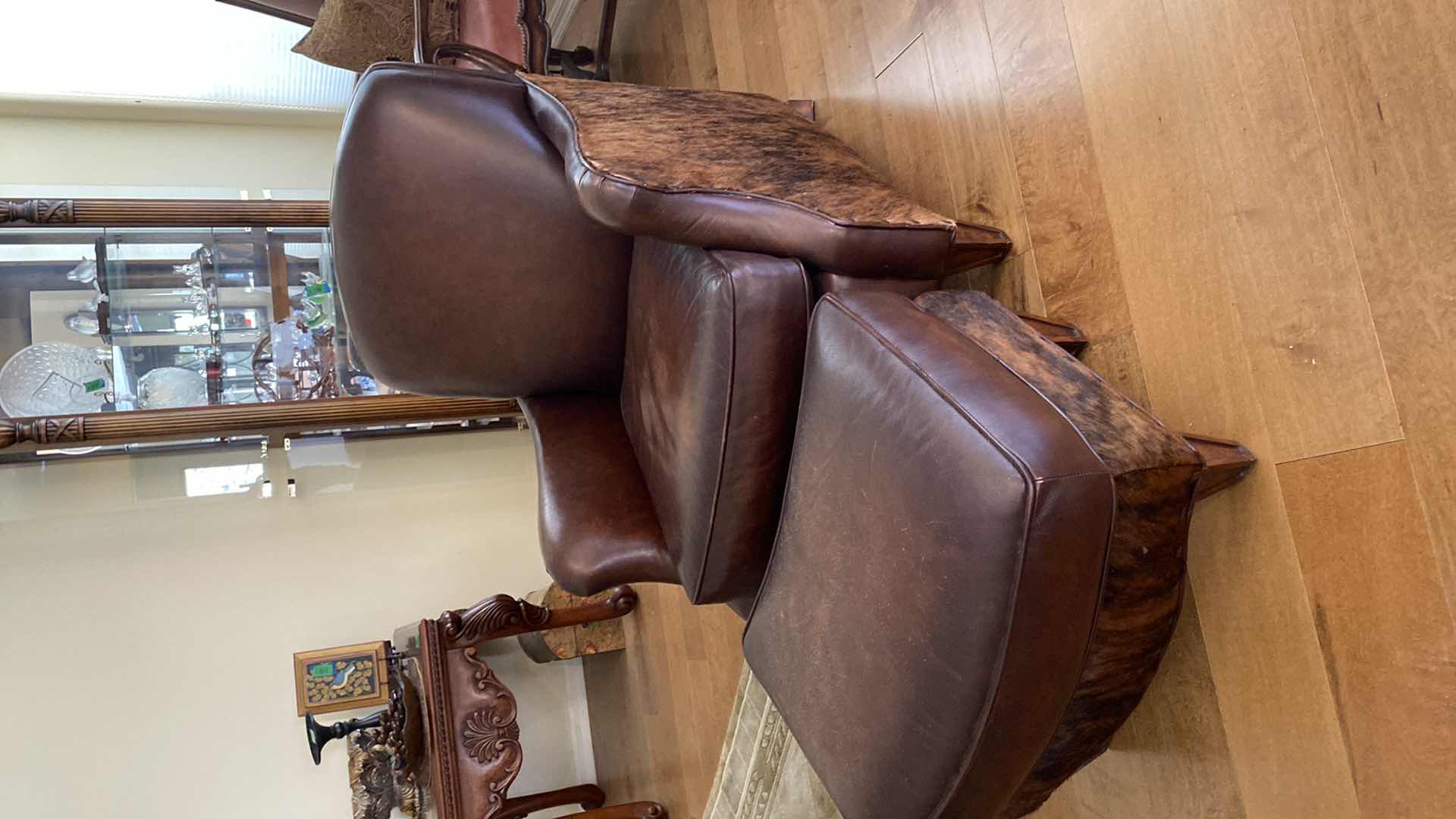 Photo 1 of WRANGLER HOME LEATHER AND HIDE OCCASIONAL CHAIR WITH OTTOMAN