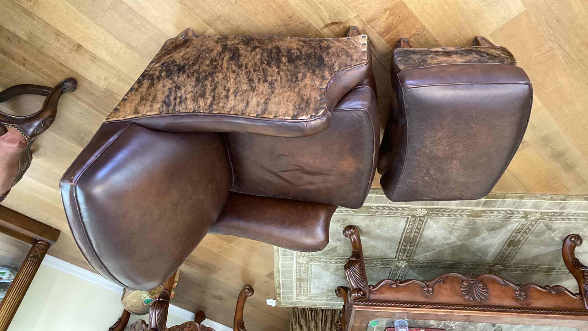 Photo 1 of WRANGLER HOME LEATHER AND HIDE OCCASIONAL CHAIR WITH OTTOMAN