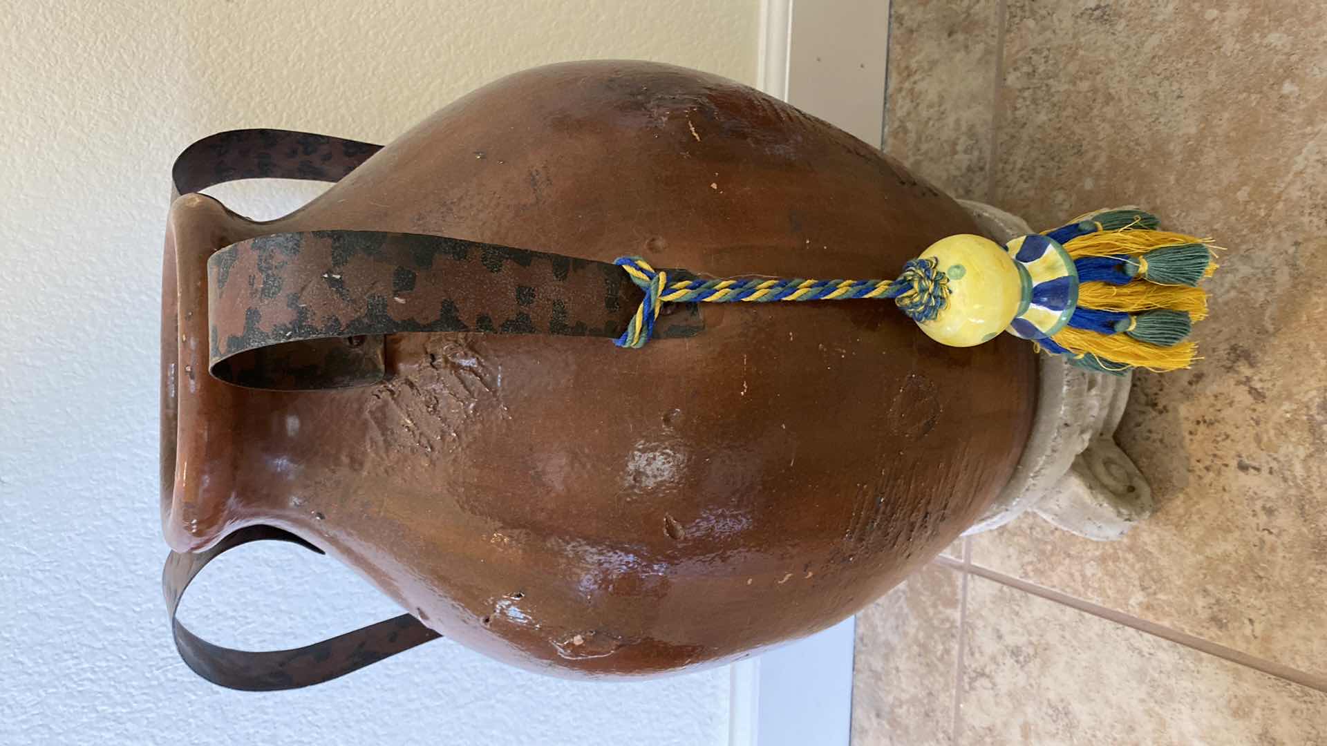 Photo 1 of BROWN POTTERY ON STAND  11” x 17”