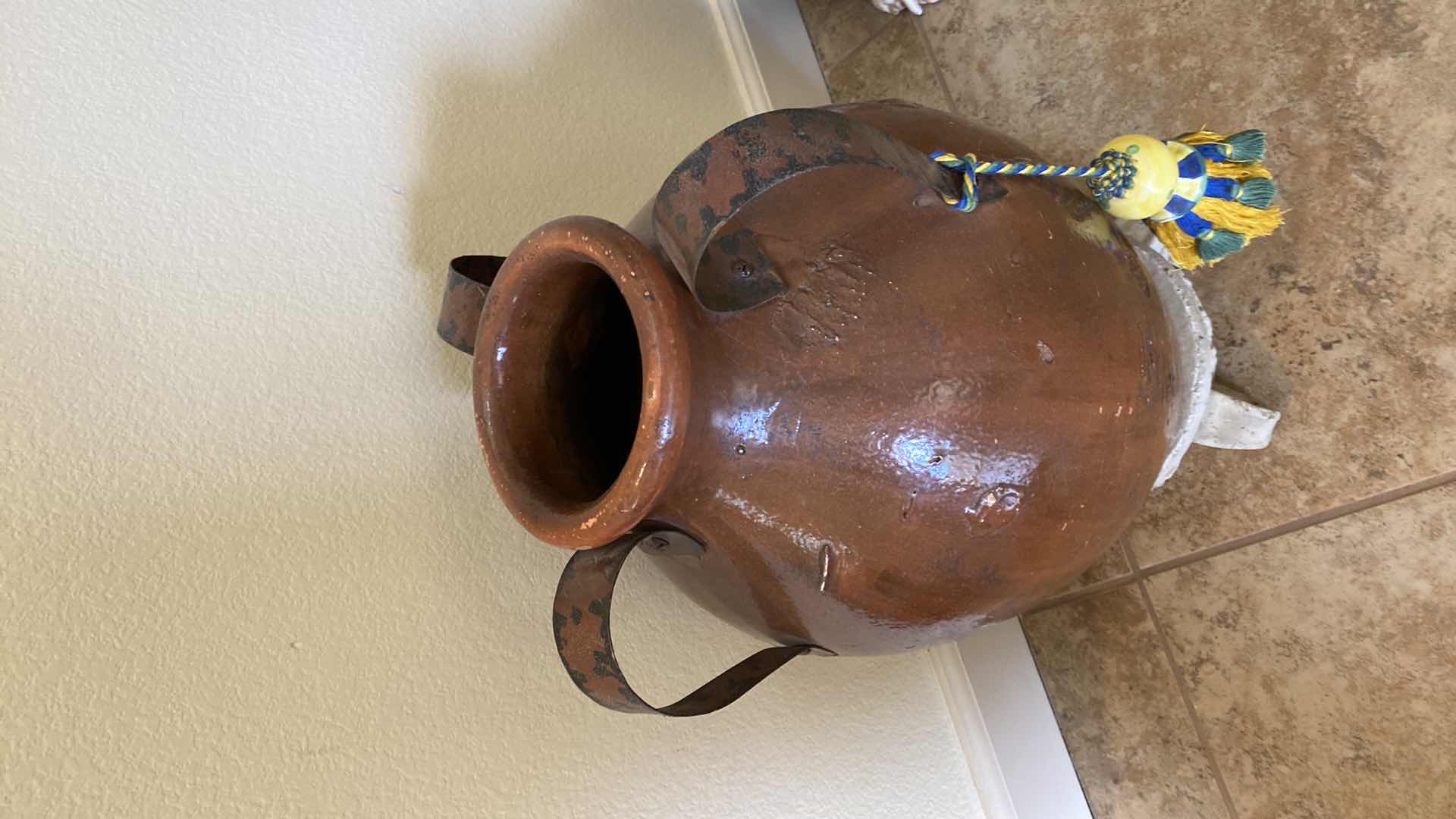 Photo 1 of BROWN POTTERY ON STAND  11” x 17”