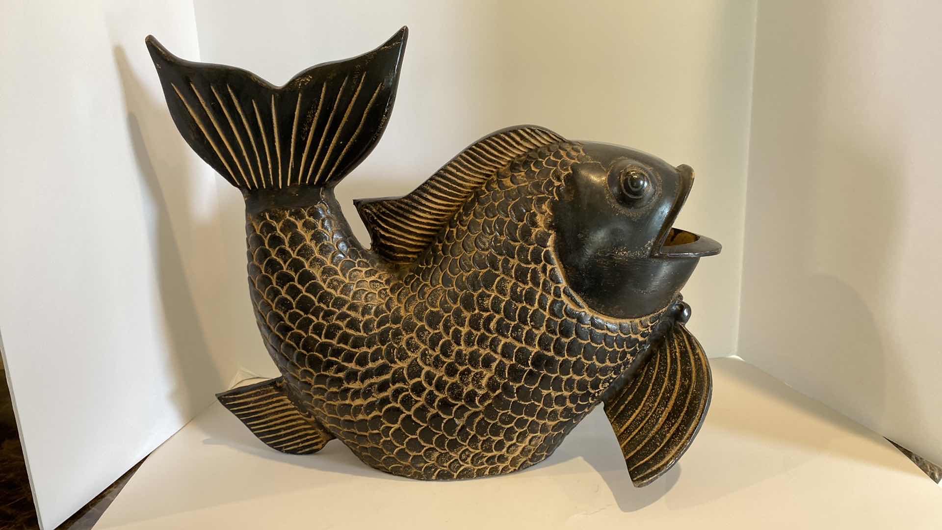 Photo 2 of CERAMIC FISH STATUE 19” x 16”