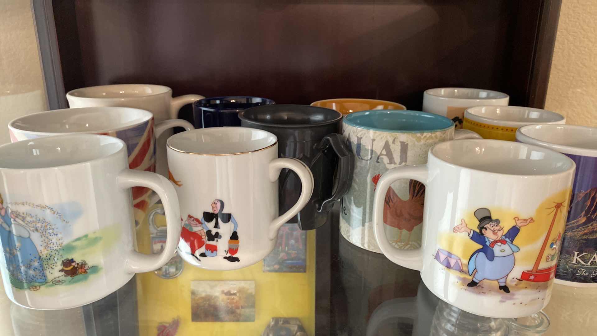 Photo 1 of CONTENTS OF CABINET DINING ROOM -COFFEE MUGS, CERAMICS SHOTGLASSES AND MORE