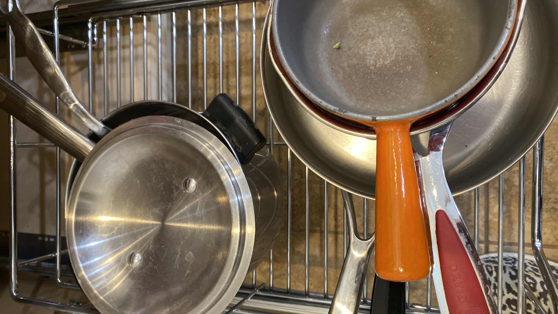 Photo 1 of CONTENTS OF KITCHEN CABINET PANS