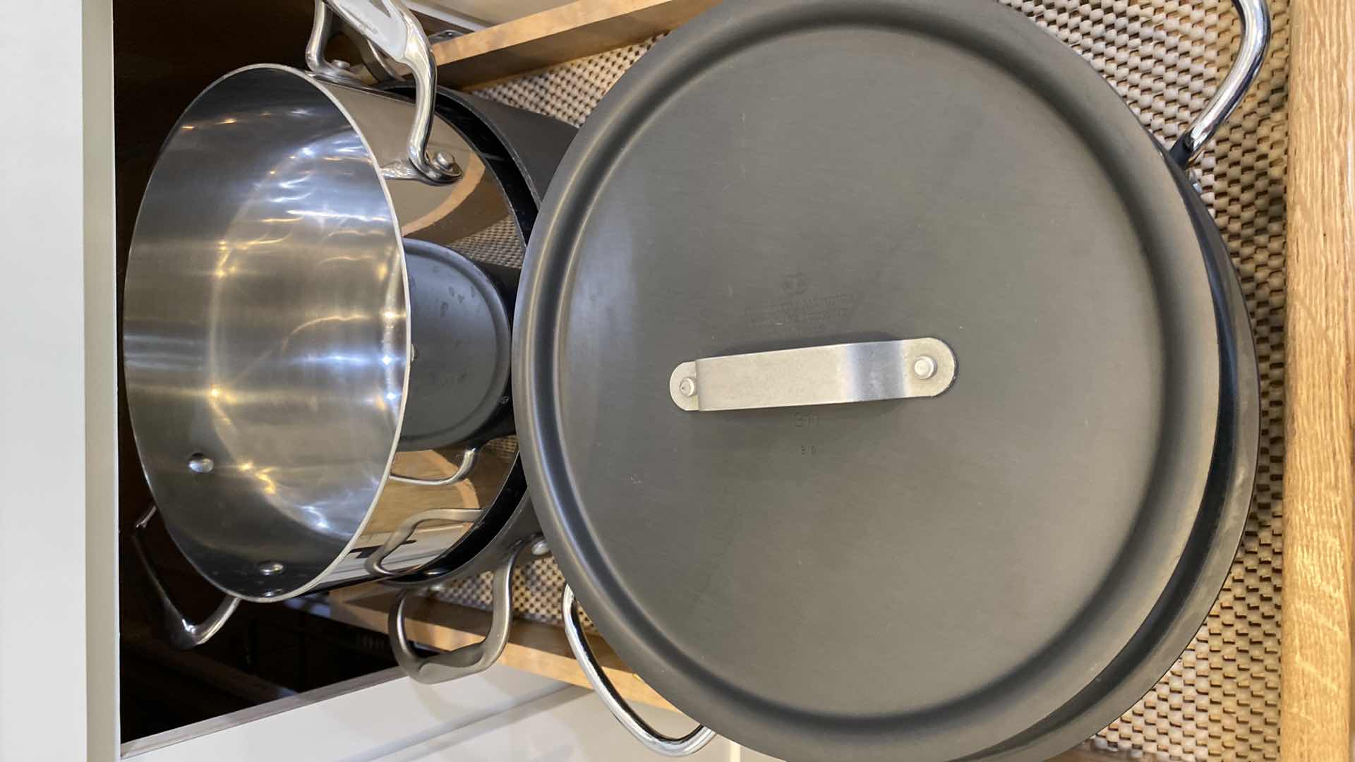 Photo 1 of CONTENTS OF KITCHEN CABINET PANS