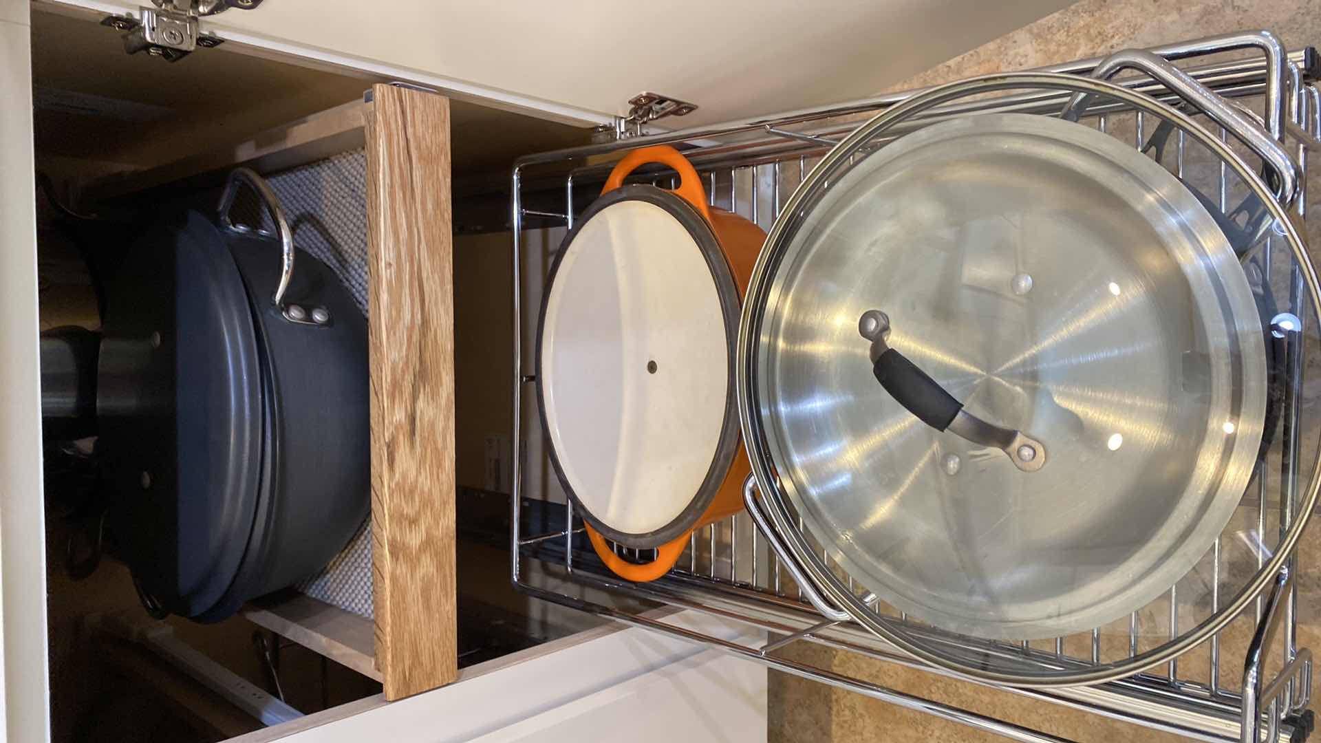 Photo 1 of CONTENTS OF KITCHEN CABINET PANS