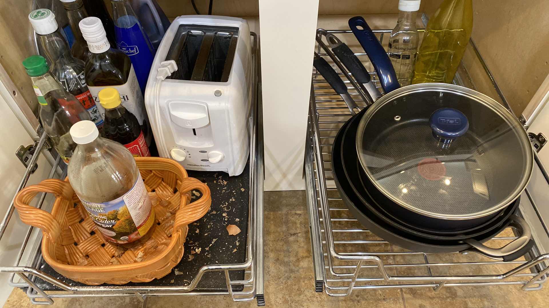 Photo 1 of CONTENTS OF KITCHEN CABINET PANS TOASTER CONDIMENTS