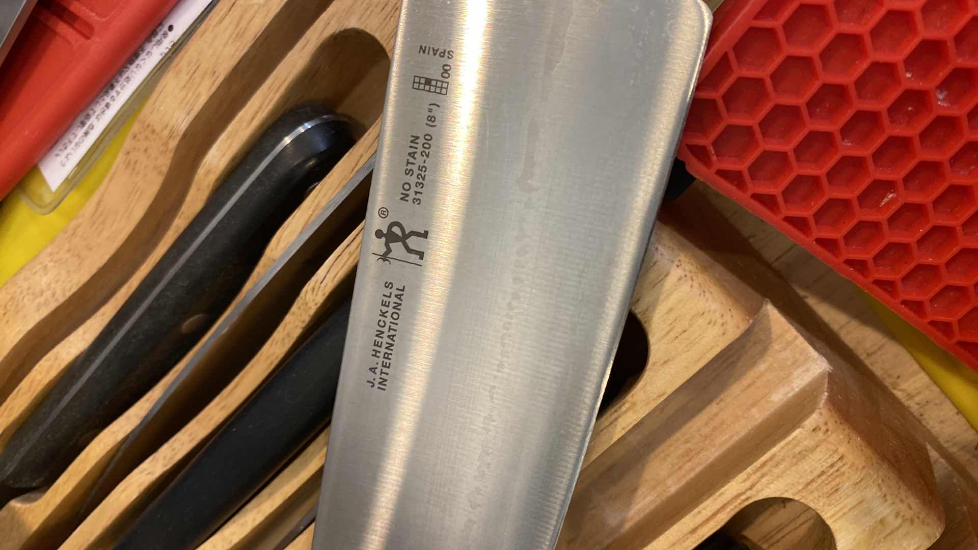 Photo 2 of CONTENTS OF KITCHEN CABINET J. A HENKEL KNIFES AND MORE