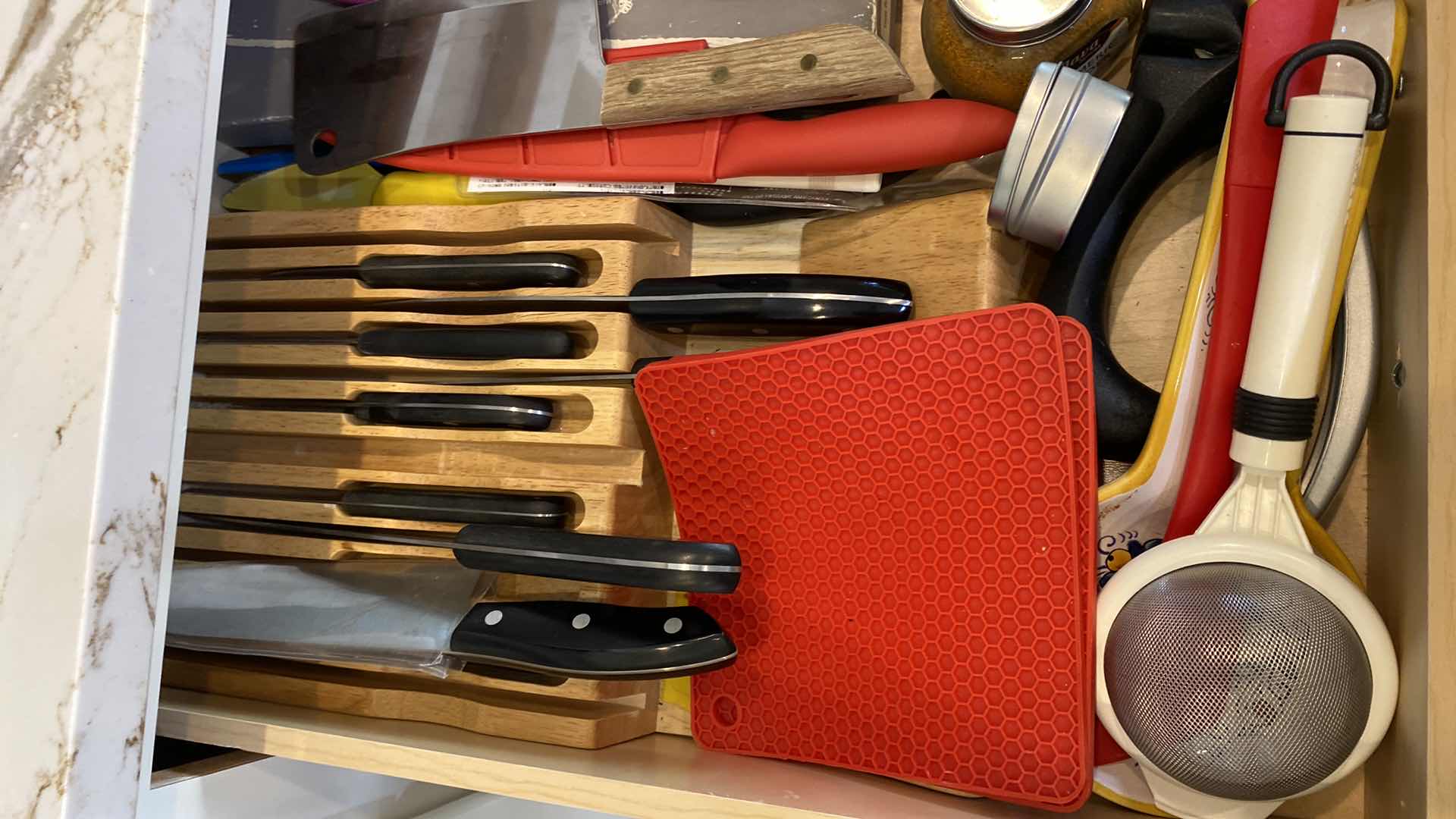 Photo 1 of CONTENTS OF KITCHEN CABINET J. A HENKEL KNIFES AND MORE