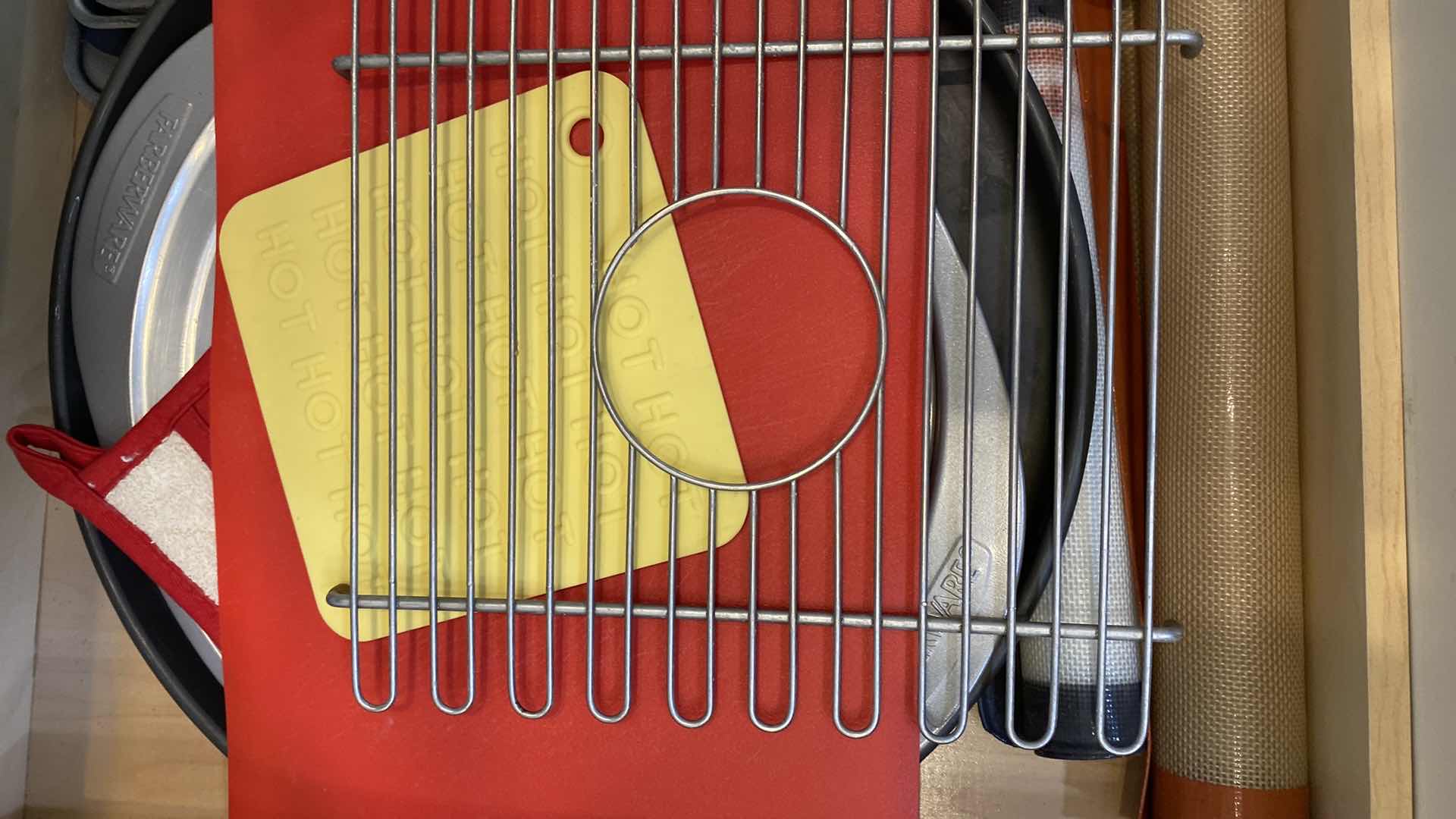 Photo 1 of CONTENTS OF KITCHEN CABINET BAKEWARE