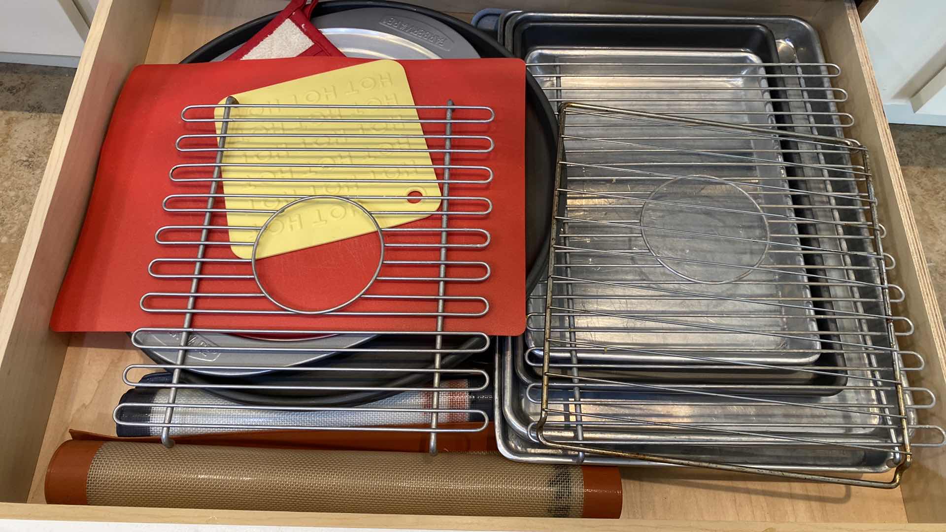 Photo 1 of CONTENTS OF KITCHEN CABINET BAKEWARE