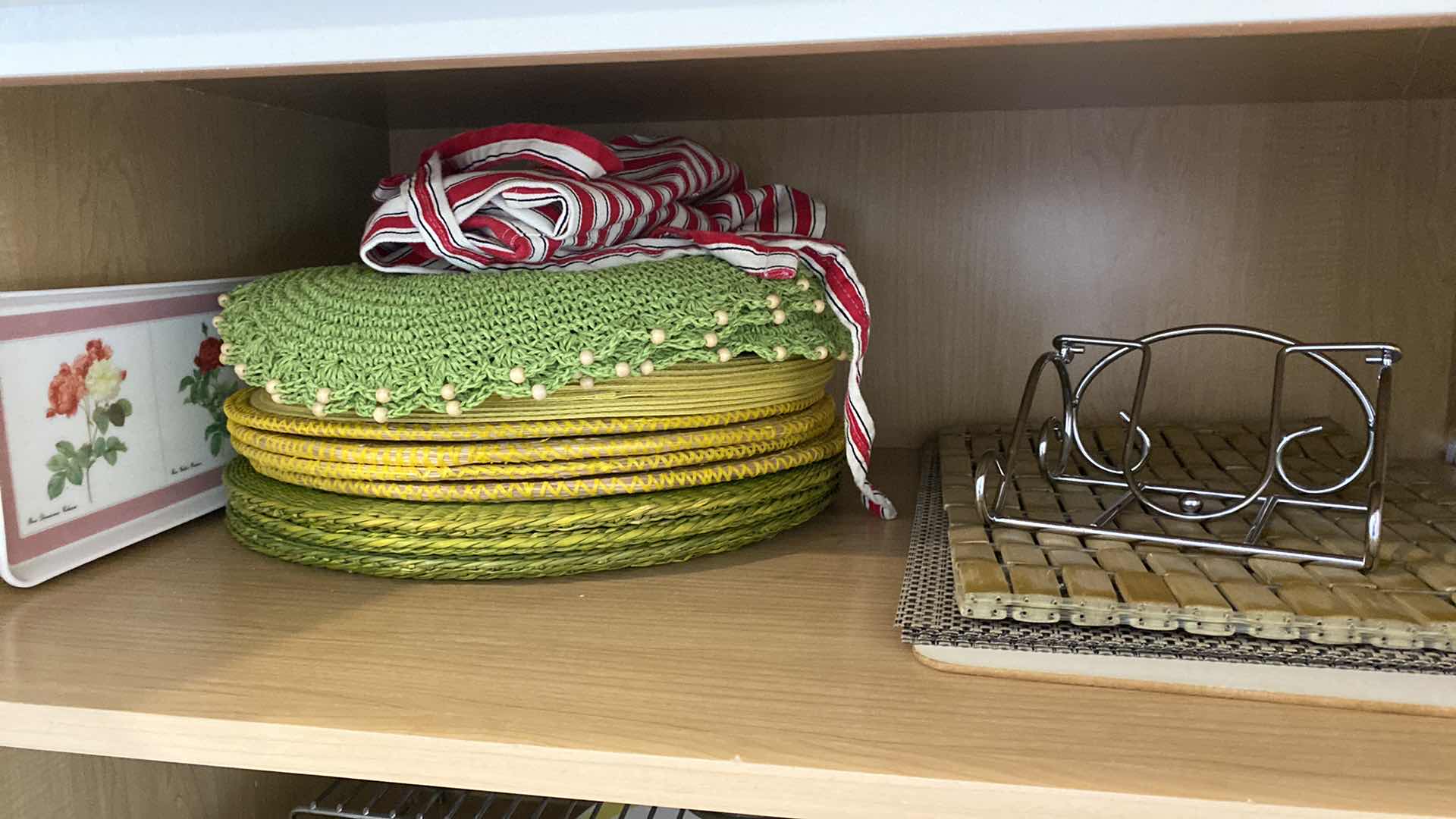 Photo 1 of CONTENTS OF SHELF KITCHEN CABINET PLACEMATS APRON AND MORE