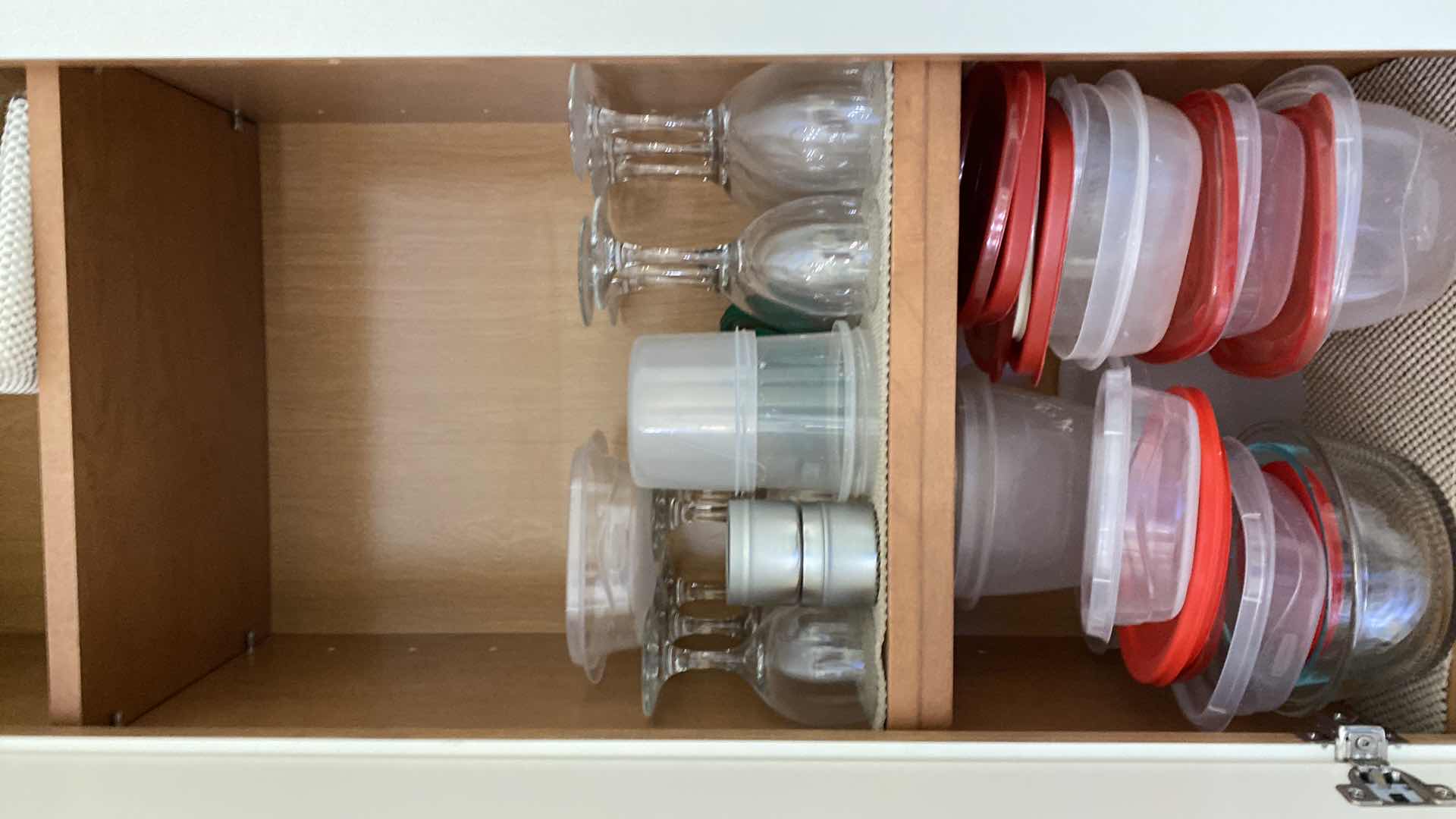 Photo 1 of CONTENTS KITCHEN CABINET GLASSES AND PLASTIC STORAGE
