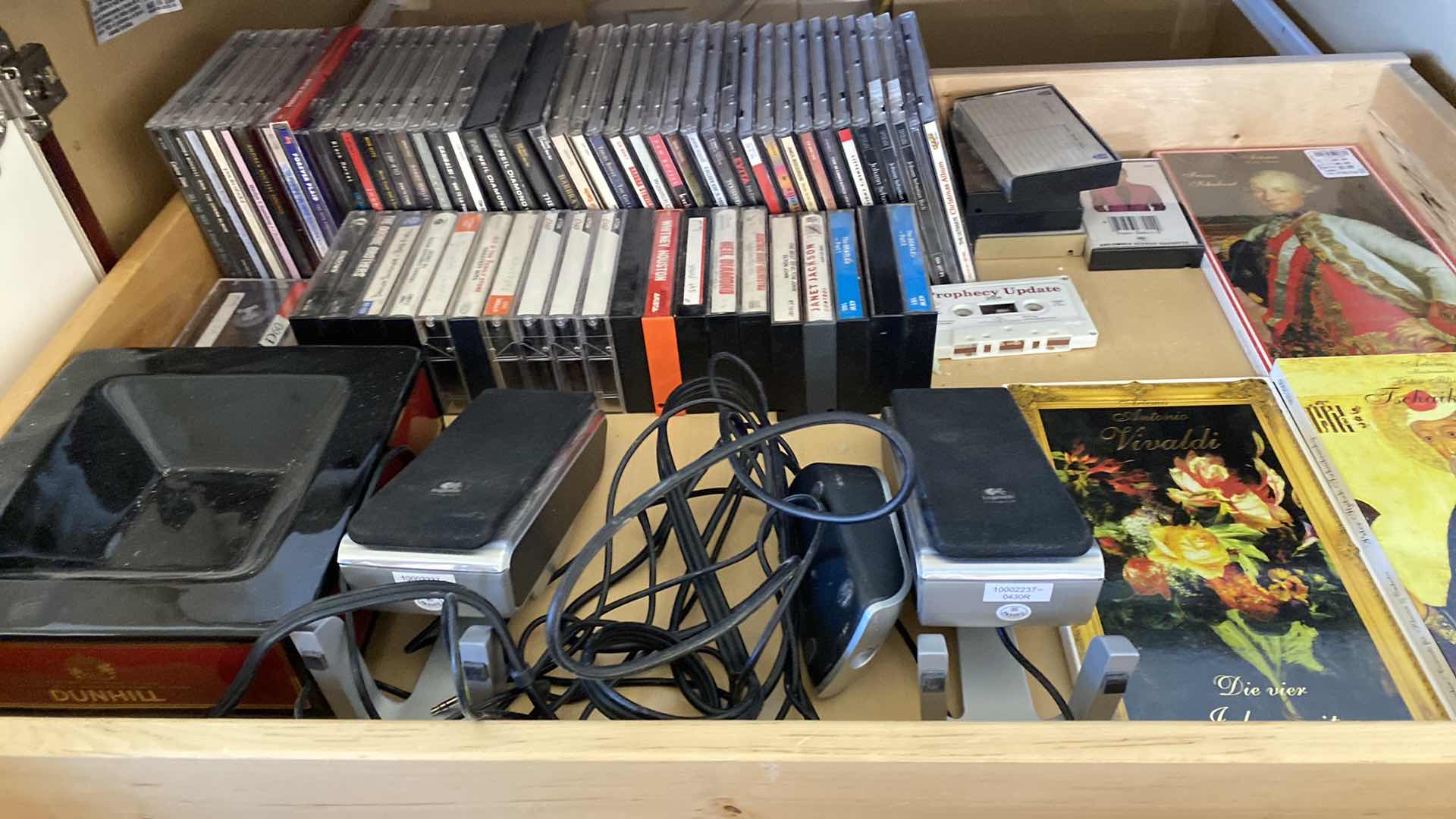 Photo 1 of CONTENTS OF CABINET FAMILY ROOM CDS SPEAKERS CASSETTES