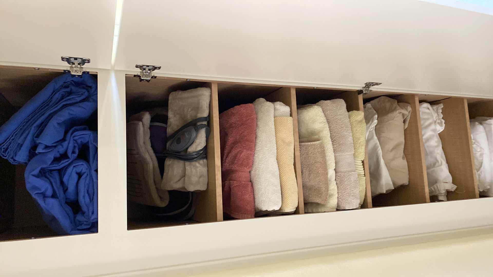 Photo 7 of CONTENTS DOWNSTAIRS LINEN CABINET TOWELS QUEEN BEDDING HEATING PADS