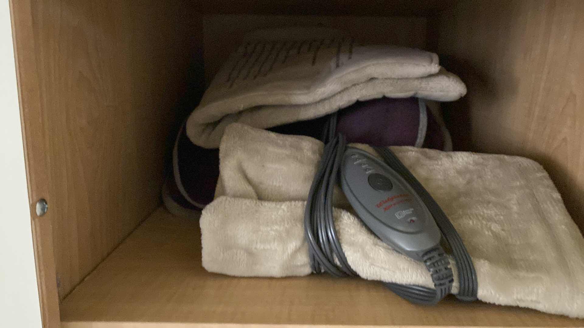 Photo 3 of CONTENTS DOWNSTAIRS LINEN CABINET TOWELS QUEEN BEDDING HEATING PADS