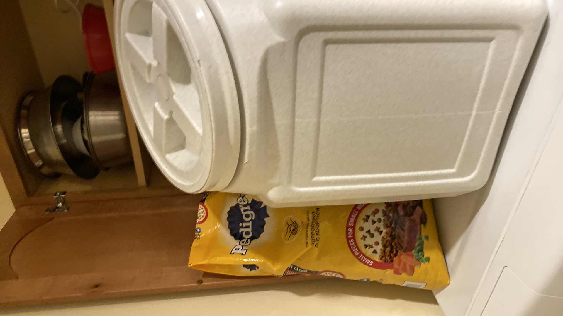 Photo 1 of CONTENTS OF LAUNDRY ROOM CABINET DOG FOOD AND MORE