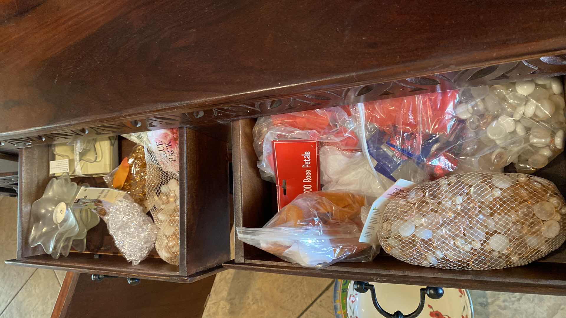 Photo 1 of 2 DRAWERS GLASS MARBLES AND VOTIVE HOLDERS IN SIDEBOARD