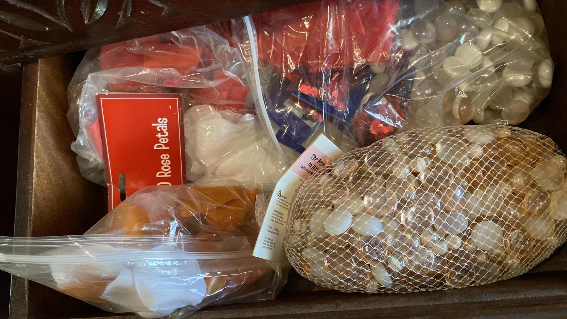 Photo 1 of 2 DRAWERS GLASS MARBLES AND VOTIVE HOLDERS IN SIDEBOARD