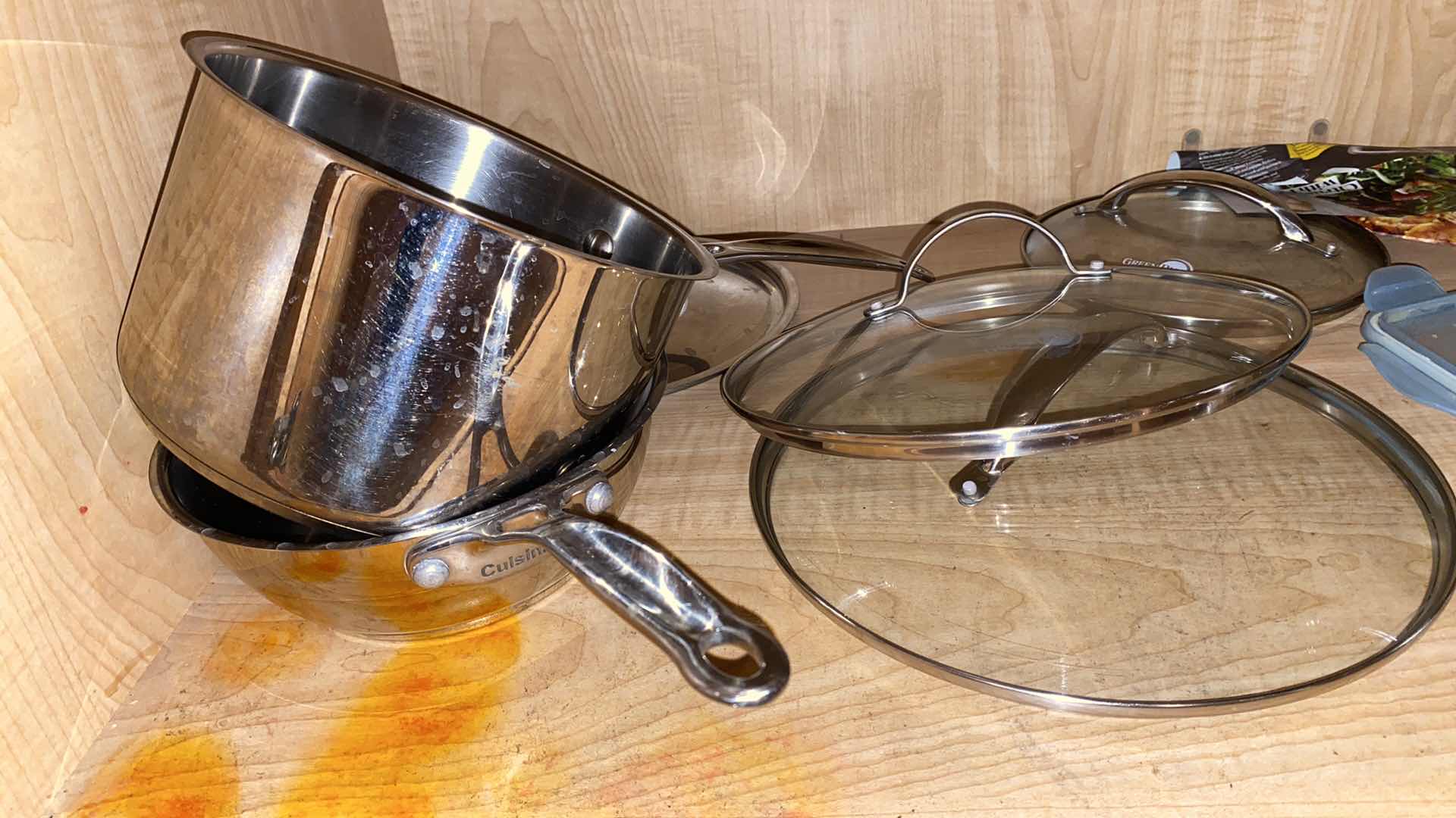 Photo 1 of CONTENTS OF CABINET POTS AND PANS