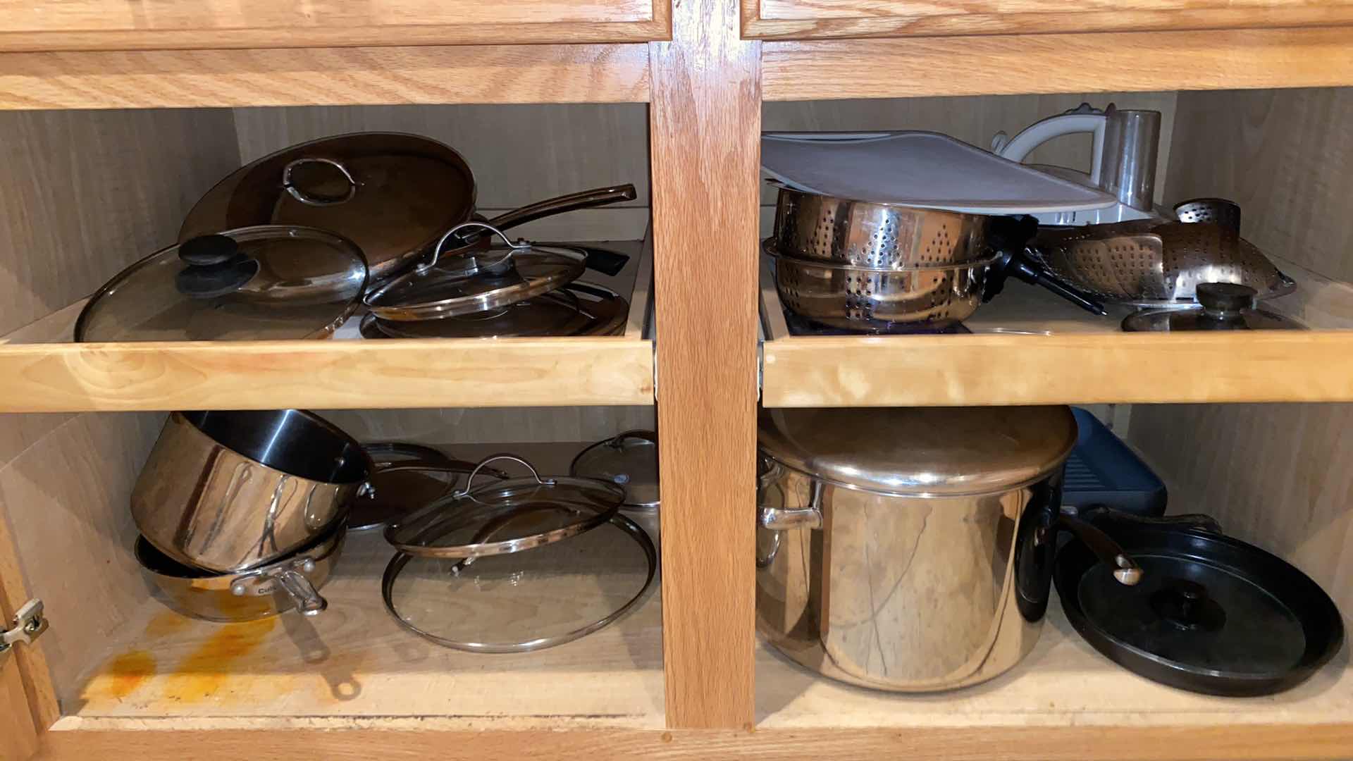 Photo 1 of CONTENTS OF CABINET POTS AND PANS