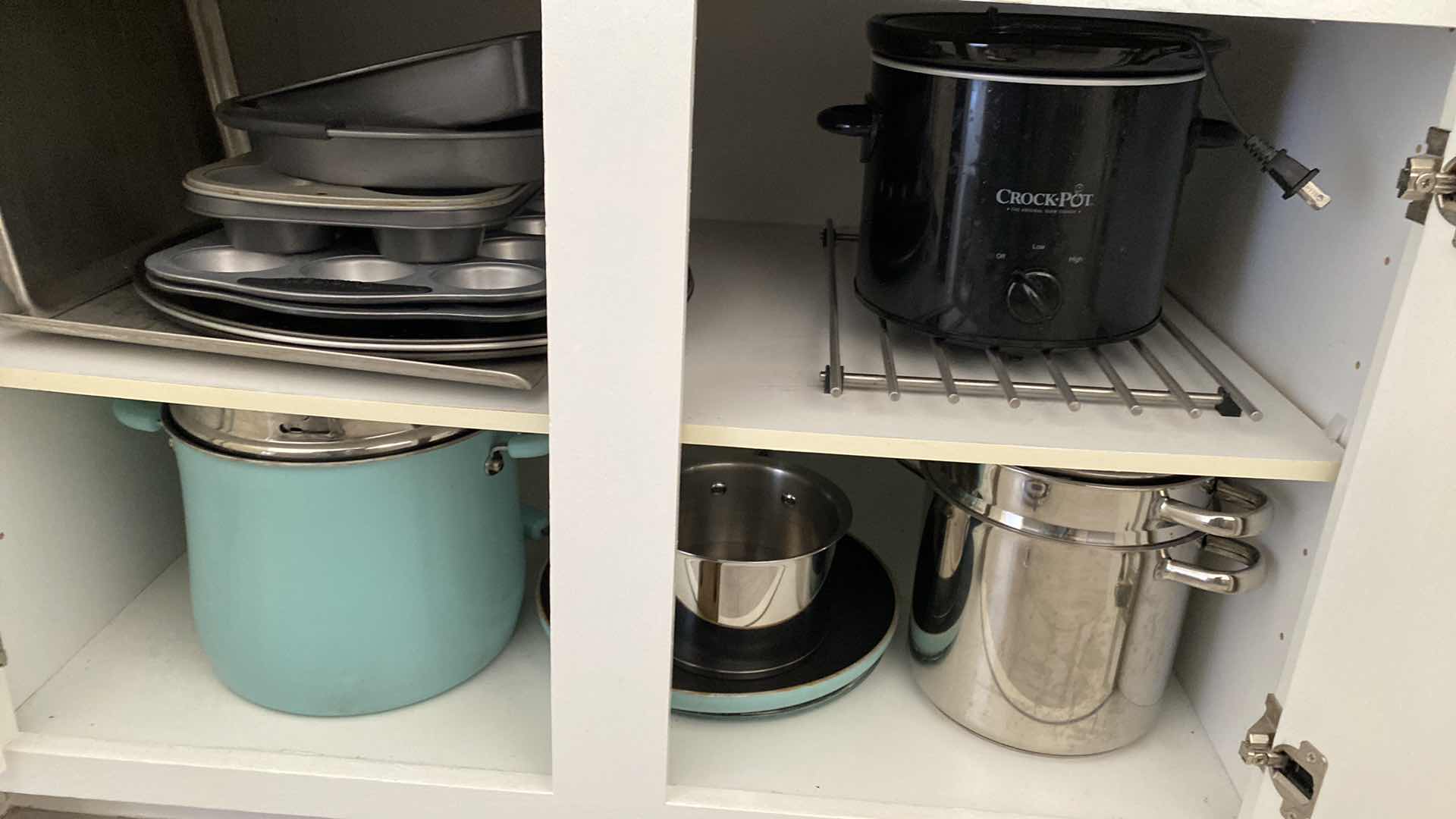 Photo 1 of CONTENTS OF CABINET BAKEWARE AND POTS AND PANS