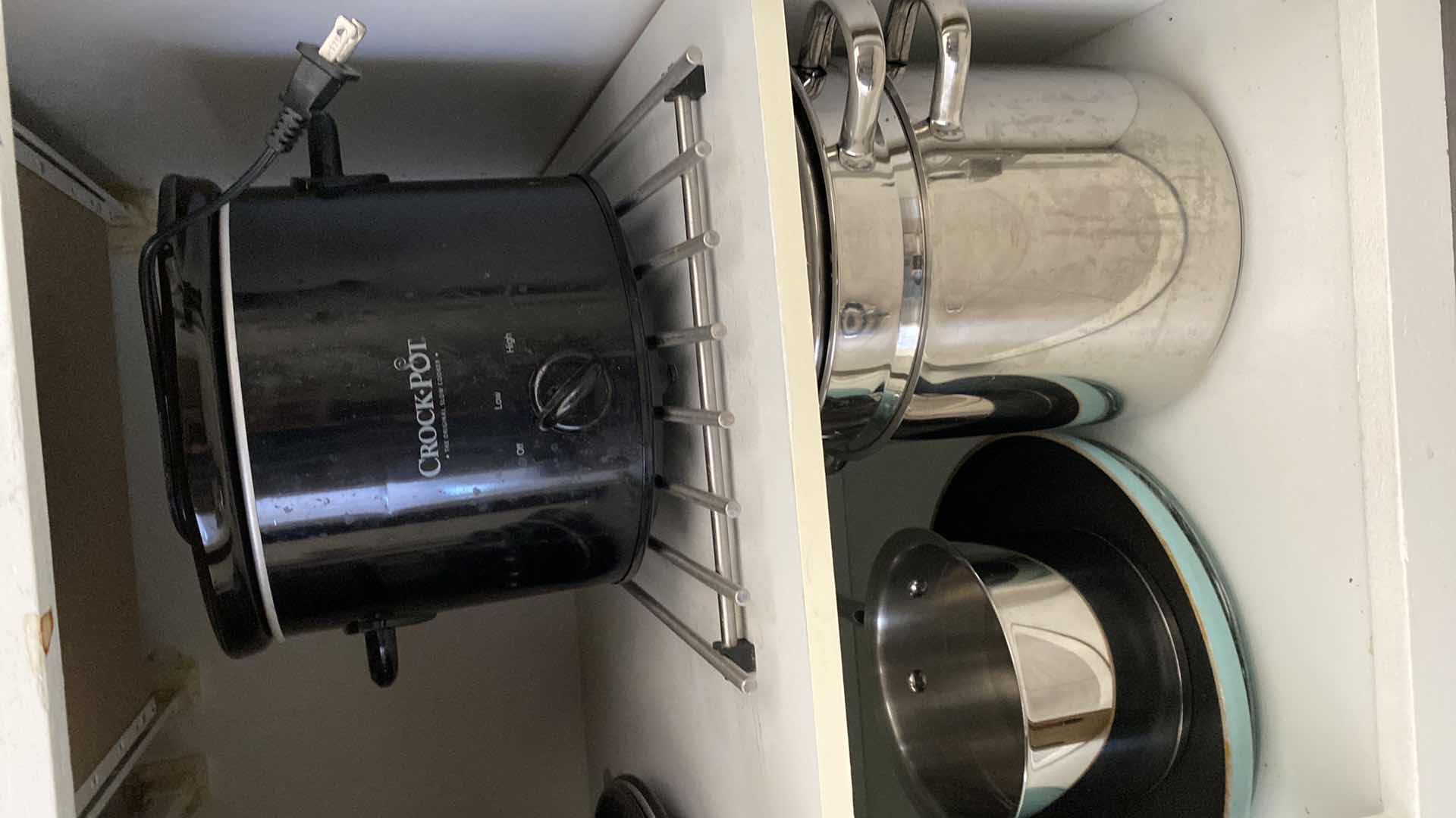 Photo 1 of CONTENTS OF CABINET BAKEWARE AND POTS AND PANS