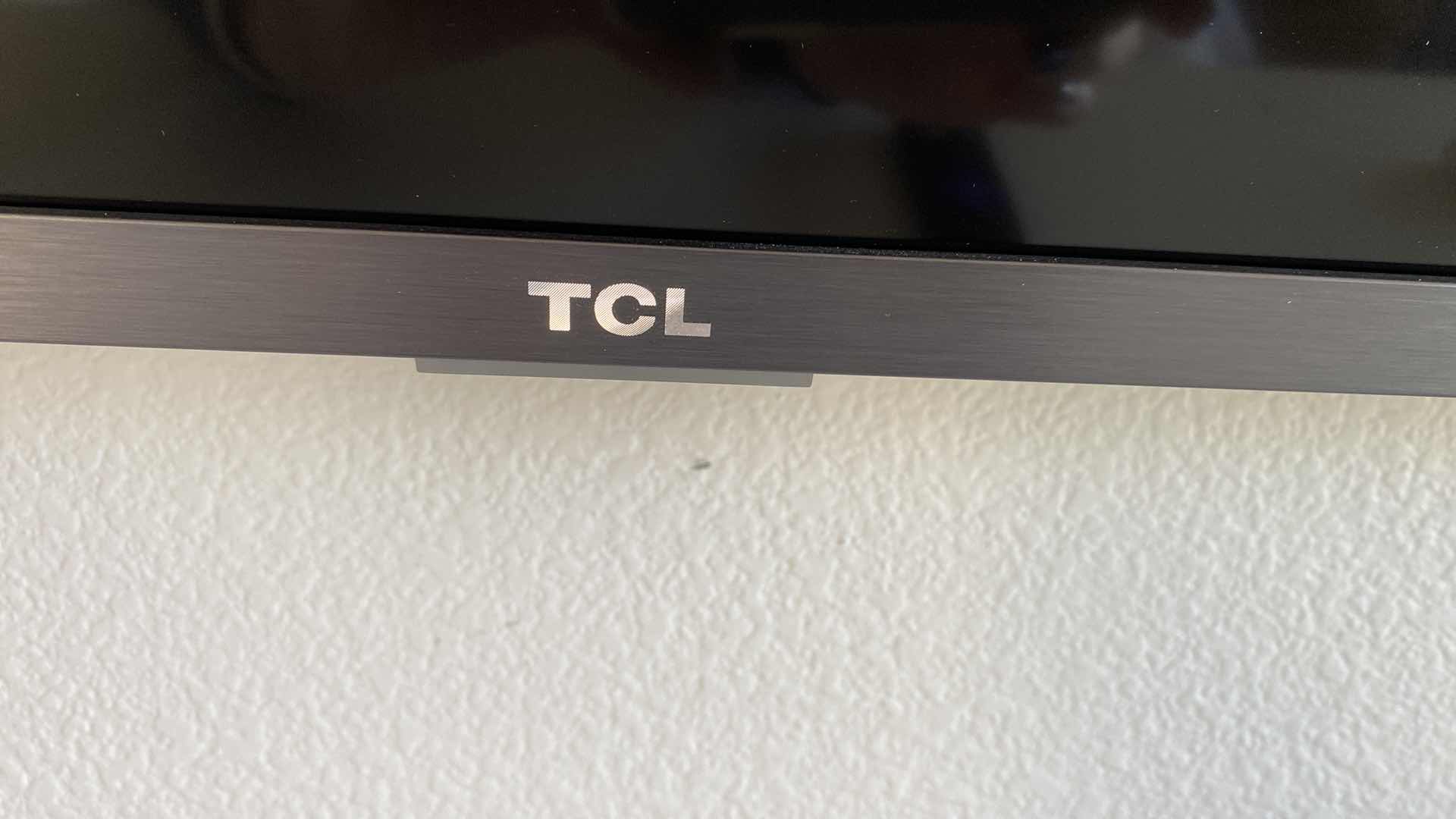 Photo 1 of TCL 65” ROKU TV WITH REMOTE