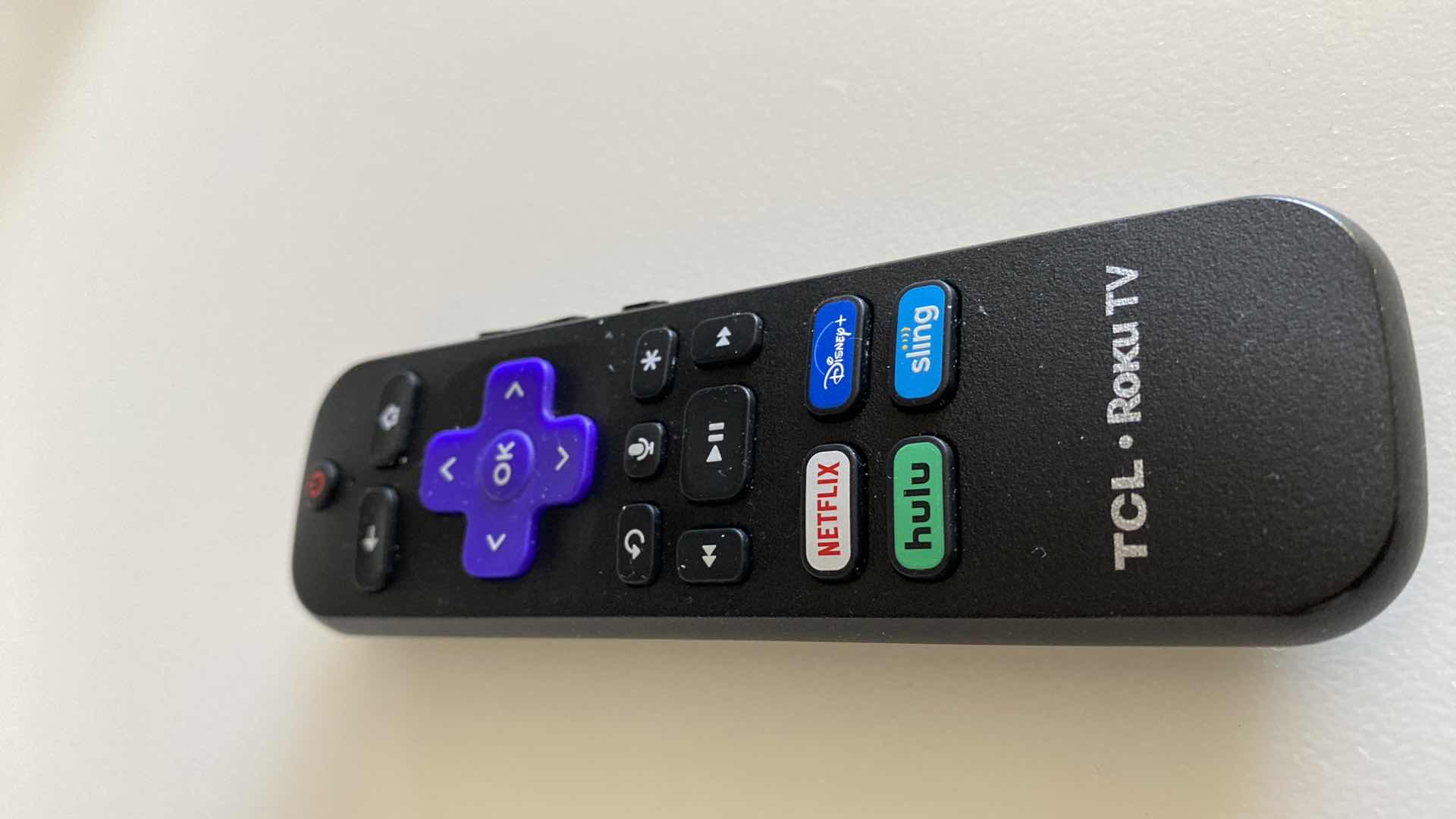 Photo 1 of TCL 65” ROKU TV WITH REMOTE