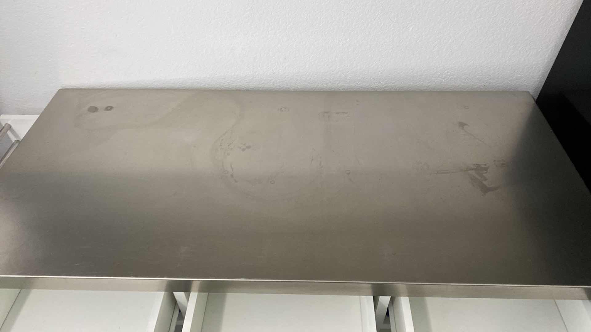 Photo 1 of KITCHEN ISLAND ROLLING CART WITH STEEL TOP 48“ x 19 H 37”