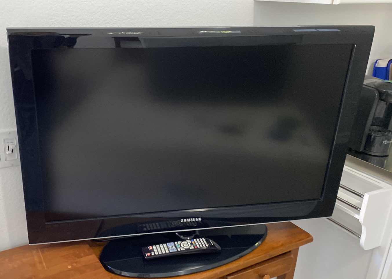 Photo 1 of SAMSUNG 40” TV WITH REMOTE