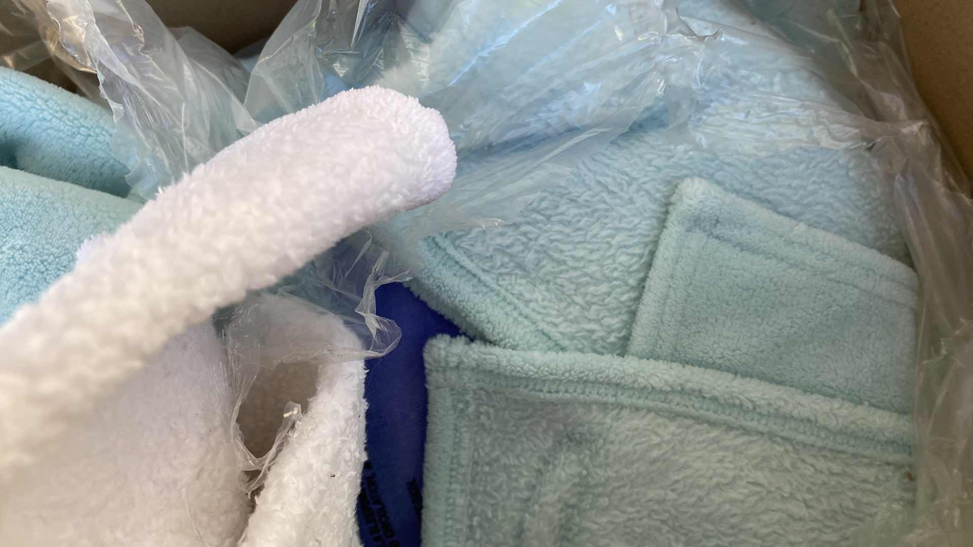 Photo 1 of BOX OF ASSORTED BLANKETS AND DOG CLOTHES