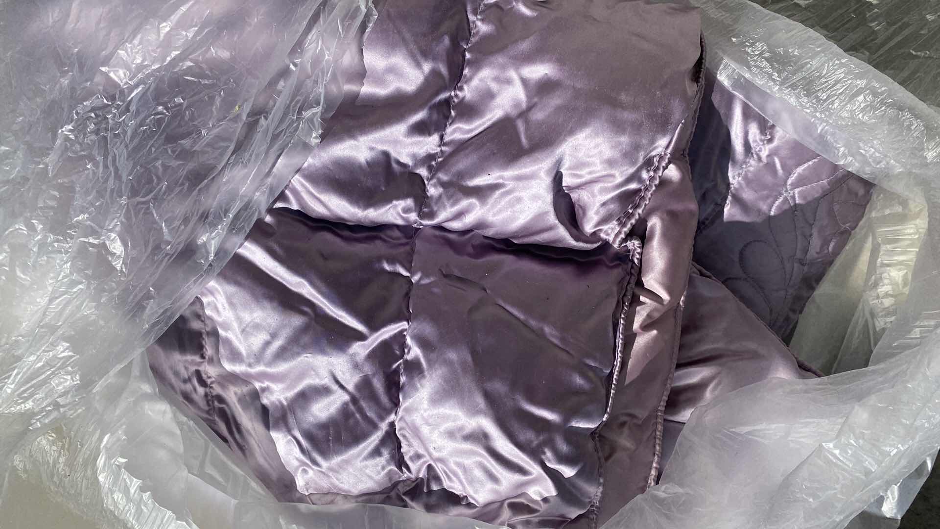 Photo 1 of BAG WITH QUEEN COMFORTER AND BAG OF BLANKETS