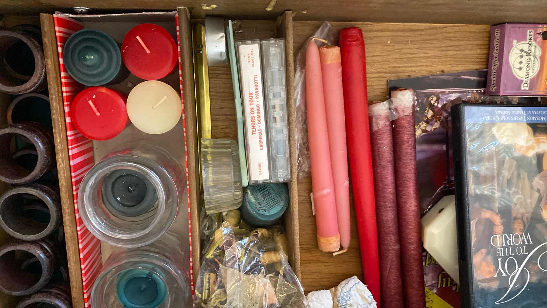 Photo 1 of CONTENTS OF DRAWER SIDEBOARD CANDLES AND SERVEWARE