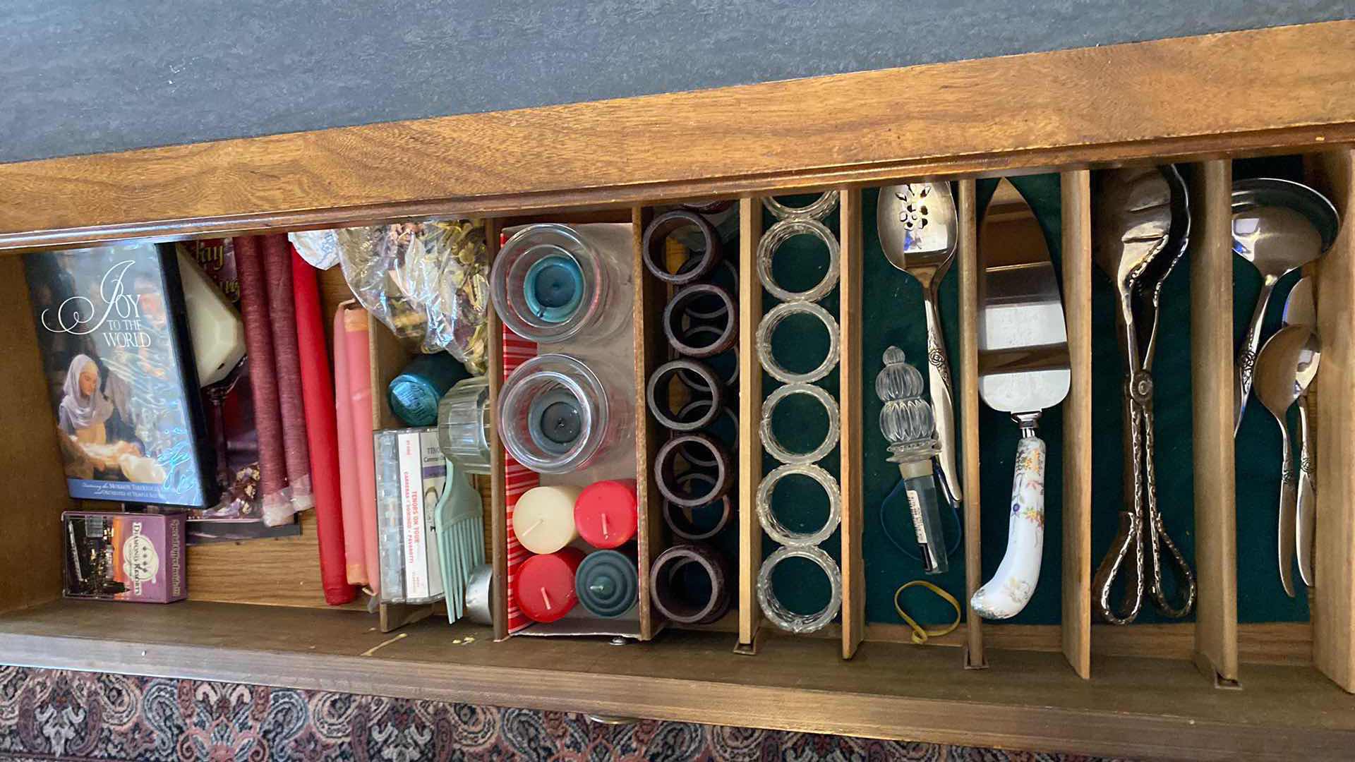 Photo 1 of CONTENTS OF DRAWER SIDEBOARD CANDLES AND SERVEWARE