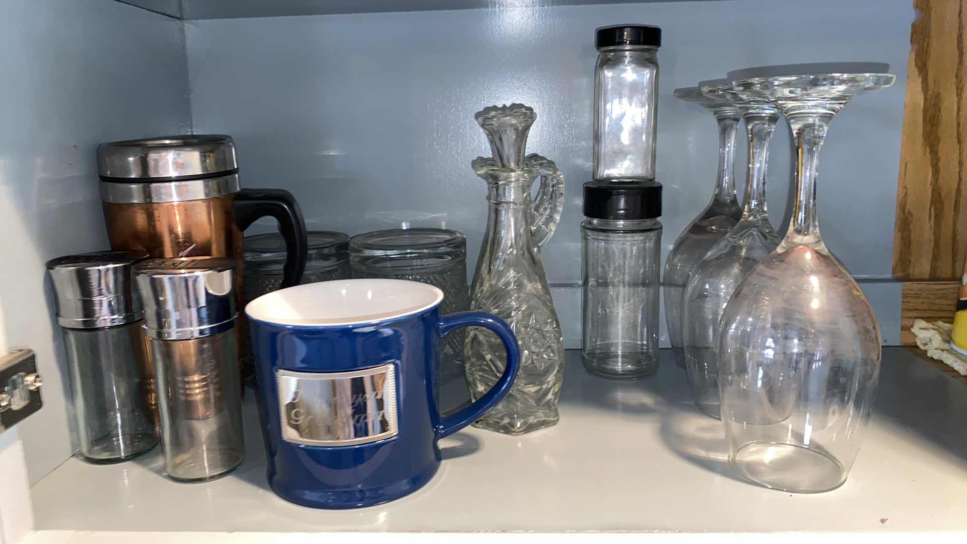 Photo 1 of CONTENTS OF KITCHEN CABINET GLASSWARE AND MORE