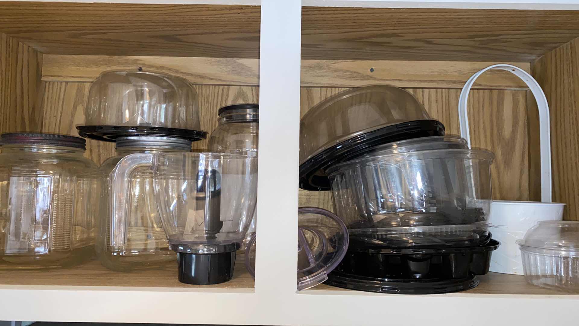 Photo 1 of CONTENTS OF KITCHEN CABINET ABOVE FRIDGE