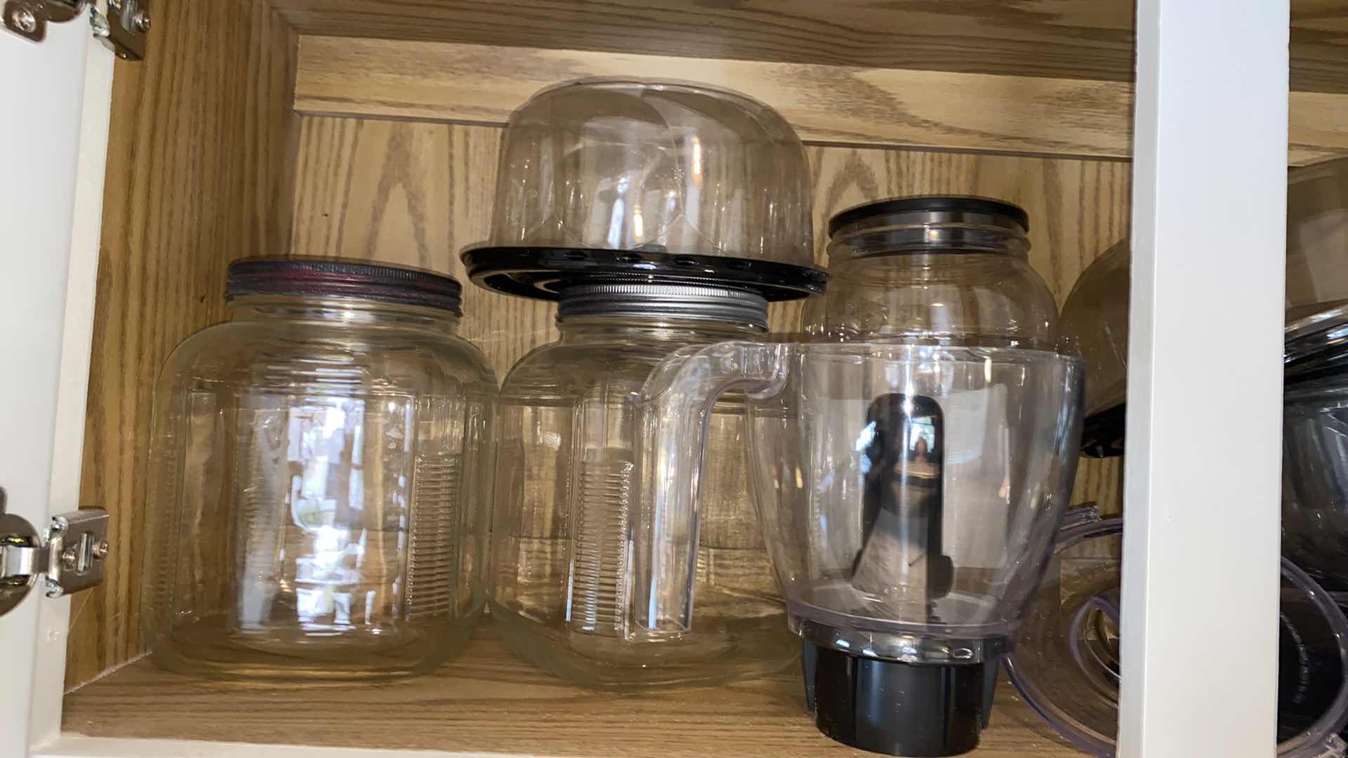 Photo 1 of CONTENTS OF KITCHEN CABINET ABOVE FRIDGE