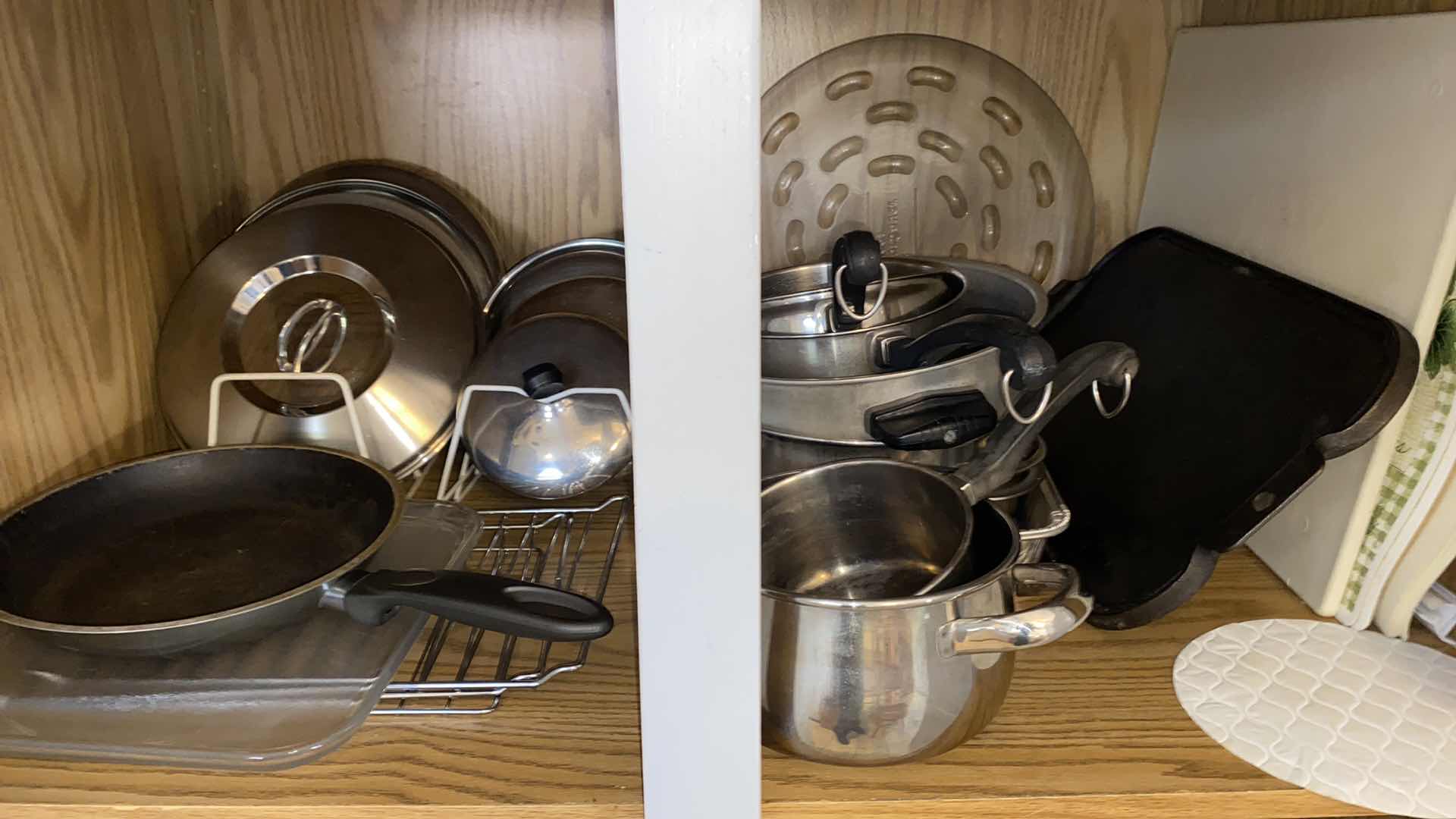 Photo 1 of CONTENTS OF KITCHEN CABINET POTS AND PANS AND MORE