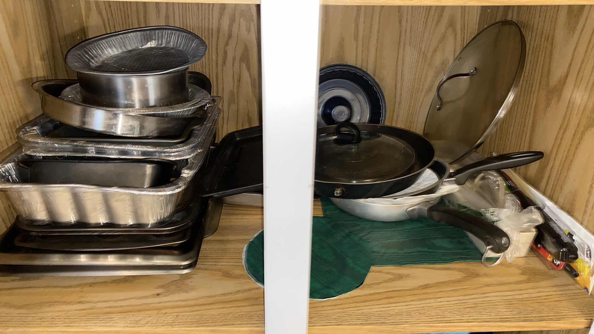 Photo 1 of CONTENTS OF KITCHEN CABINET POTS AND PANS AND MORE