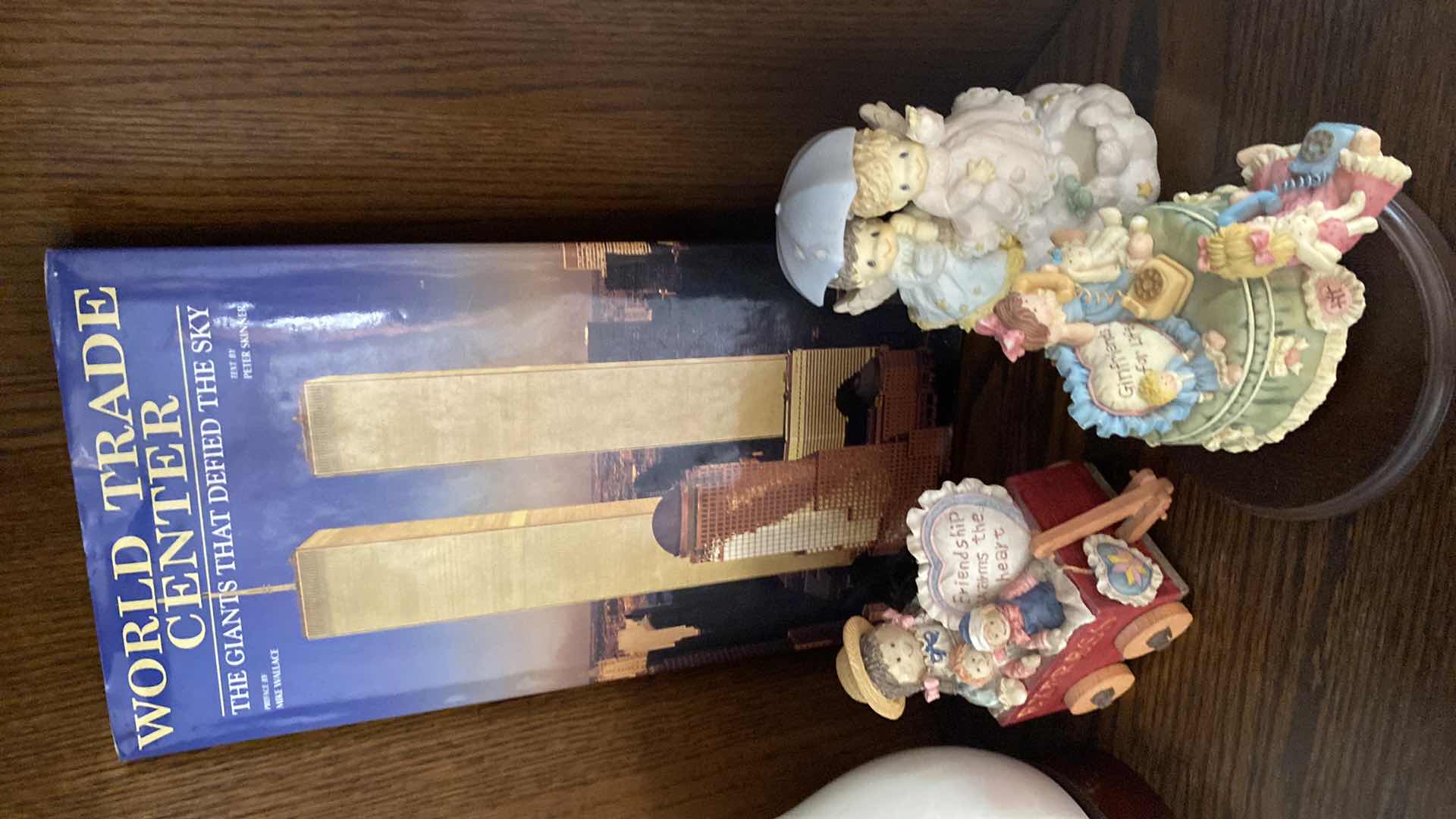 Photo 1 of HOME DECOR WORKS TRADE CENTER BOOK AND FIGURINES