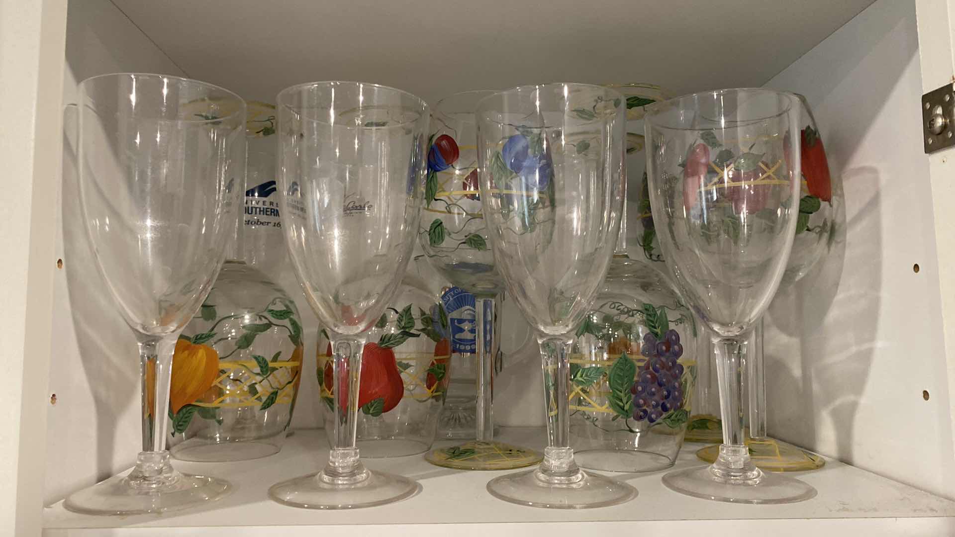Photo 1 of CONTENTS KITCHEN CABINET GLASSES AND HAND PAINTED STEMWARE