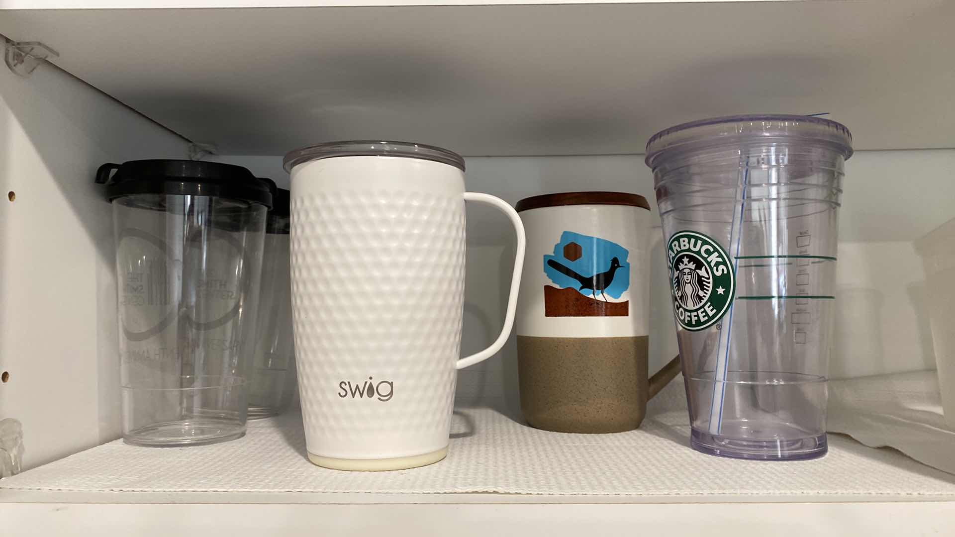 Photo 1 of CONTENTS KITCHEN CABINET MUGS AND CUPS
