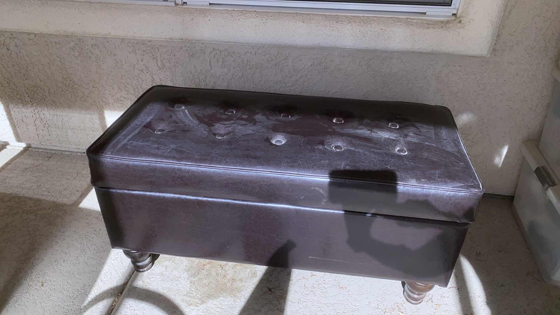 Photo 1 of BONDED LEATHER OTTOMAN 37“ x 17“ H 19” WITH TABLECLOTHS AND PLACEMATS