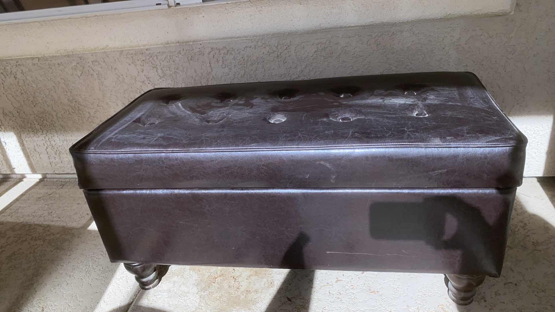 Photo 1 of BONDED LEATHER OTTOMAN 37“ x 17“ H 19” WITH TABLECLOTHS AND PLACEMATS