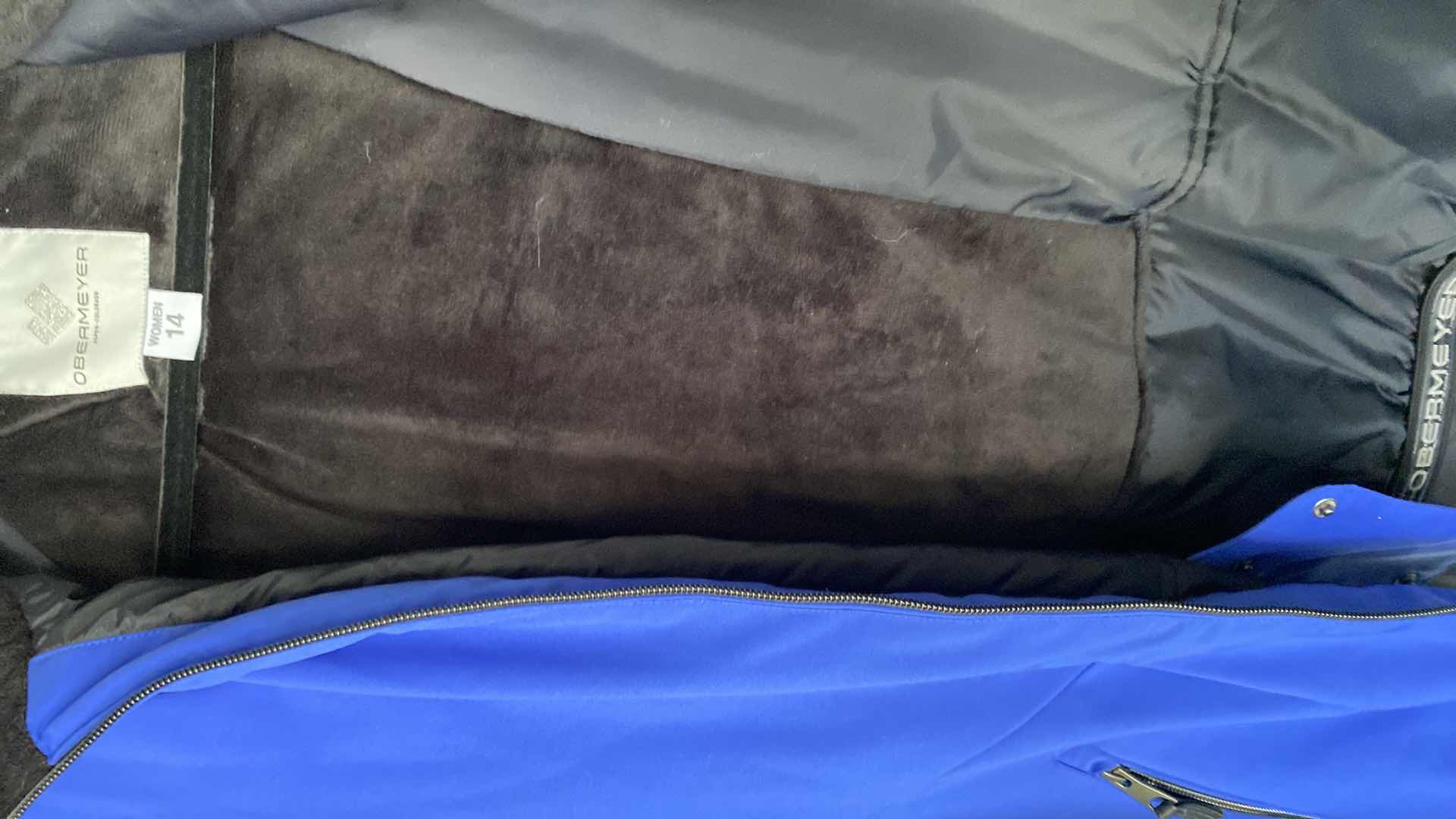 Photo 1 of WOMENS SIZE 14 OBERMEYER TUSCANY INSULATED HIP LENGTH SKI JACKET WITH THUMB HOLES AND POWDER SKIRT LIKE NEW