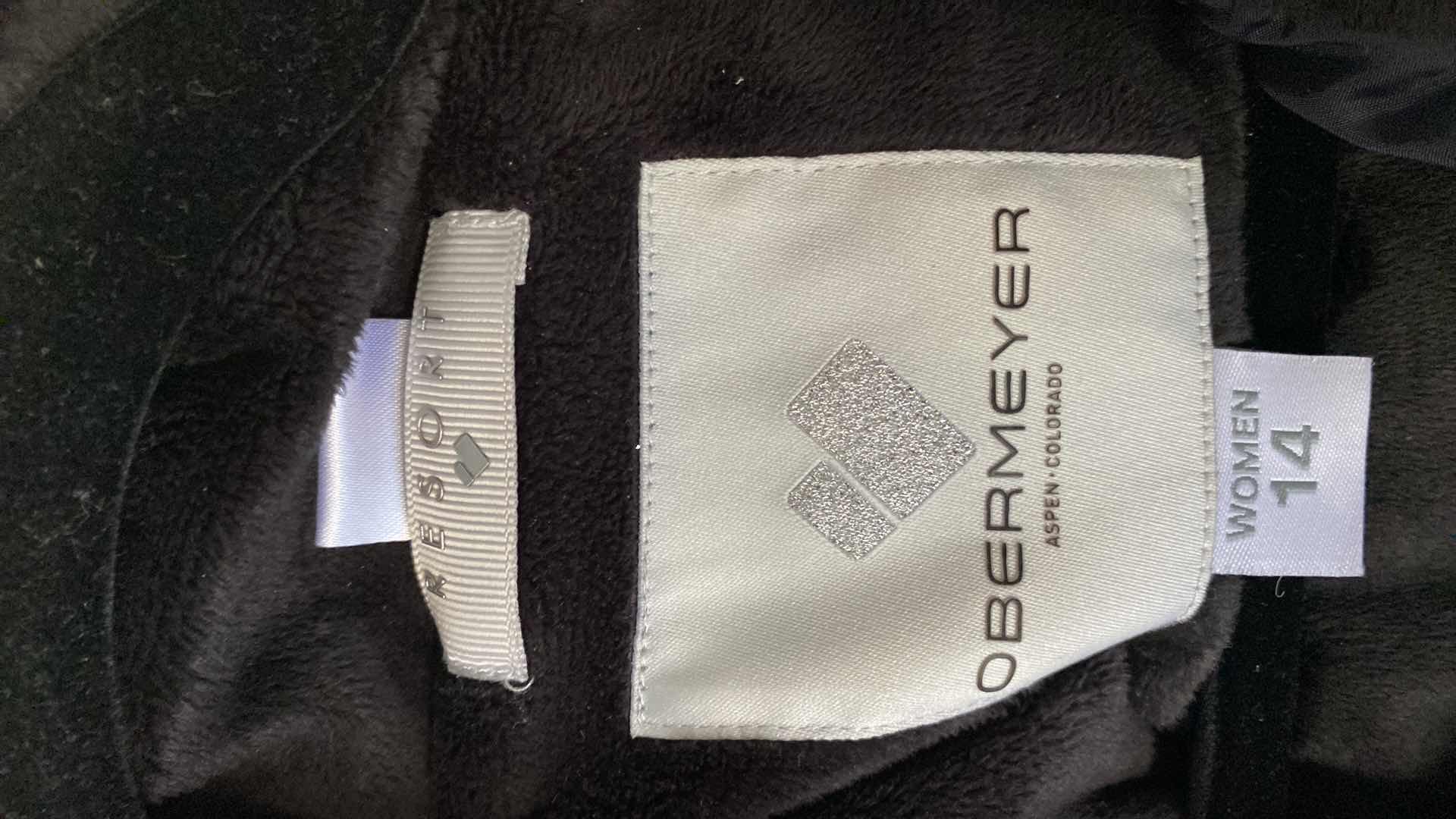 Photo 1 of WOMENS SIZE 14 OBERMEYER TUSCANY INSULATED HIP LENGTH SKI JACKET WITH THUMB HOLES AND POWDER SKIRT LIKE NEW