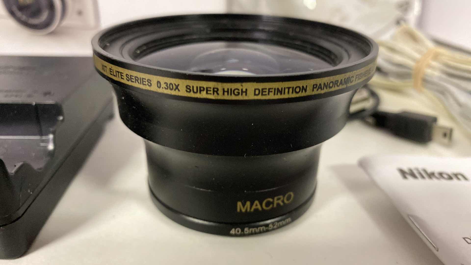 Photo 1 of NIKON 1 CAMERA WITH CASE, MACRO  LENS, 2 CHARGERS BOOKLETS