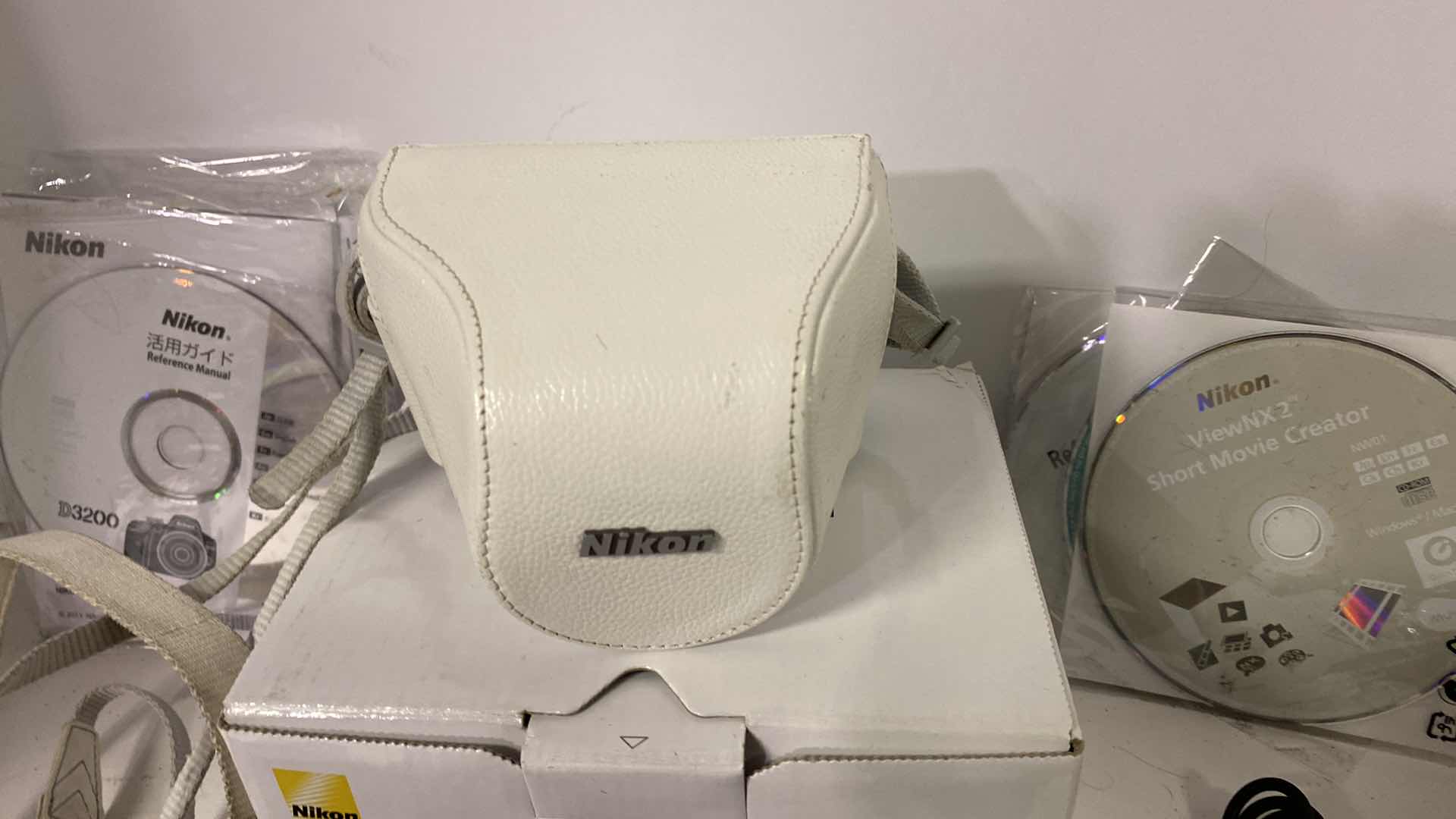 Photo 1 of NIKON 1 CAMERA WITH CASE, MACRO  LENS, 2 CHARGERS BOOKLETS