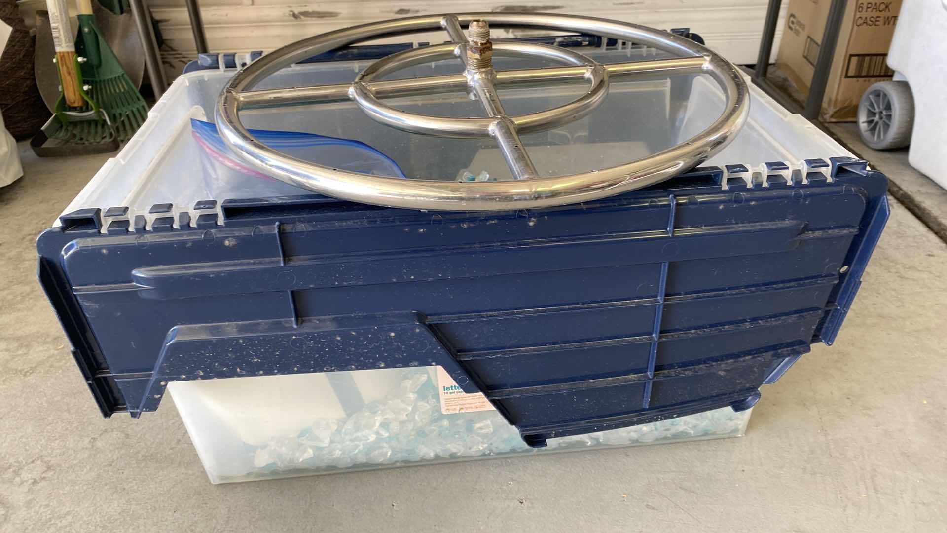 Photo 1 of $350 LARGE CRATE OF FIRE PIT GLASS AND 18” RING FOR FIRE PIT